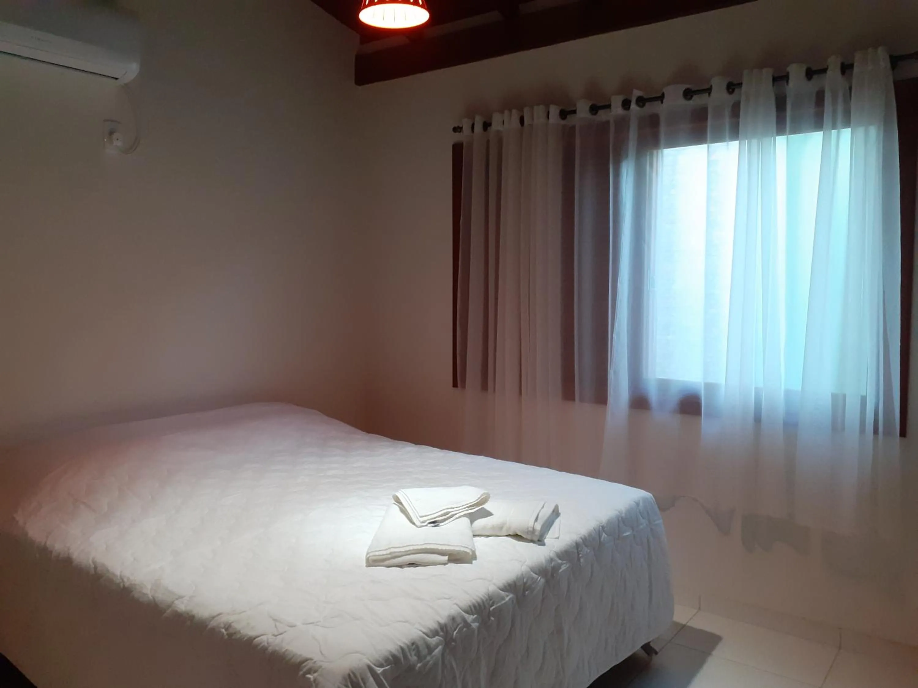Photo of the whole room, Bed in Vila Figueiredo das Donas