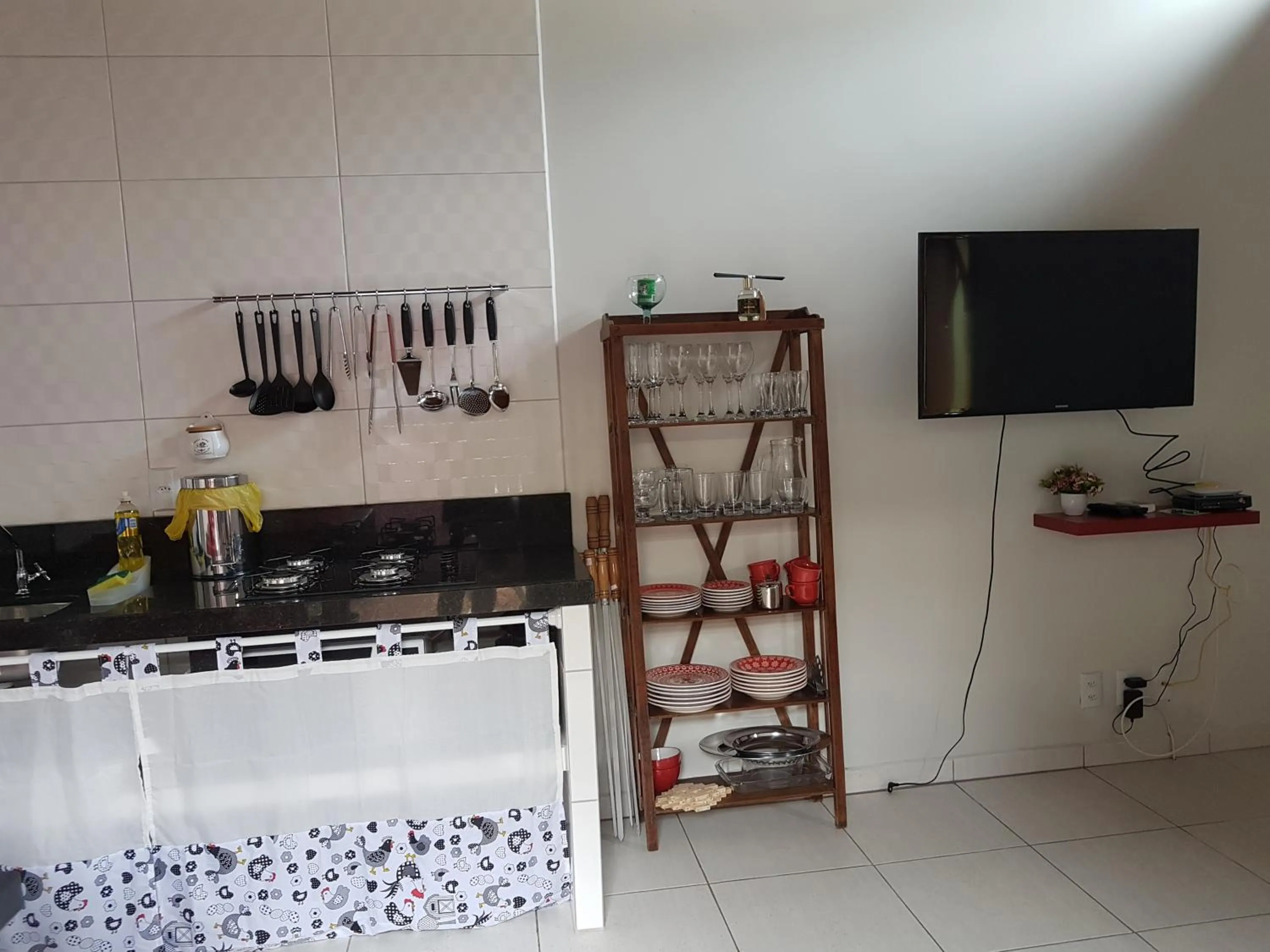 Communal lounge/ TV room in Vila Figueiredo das Donas