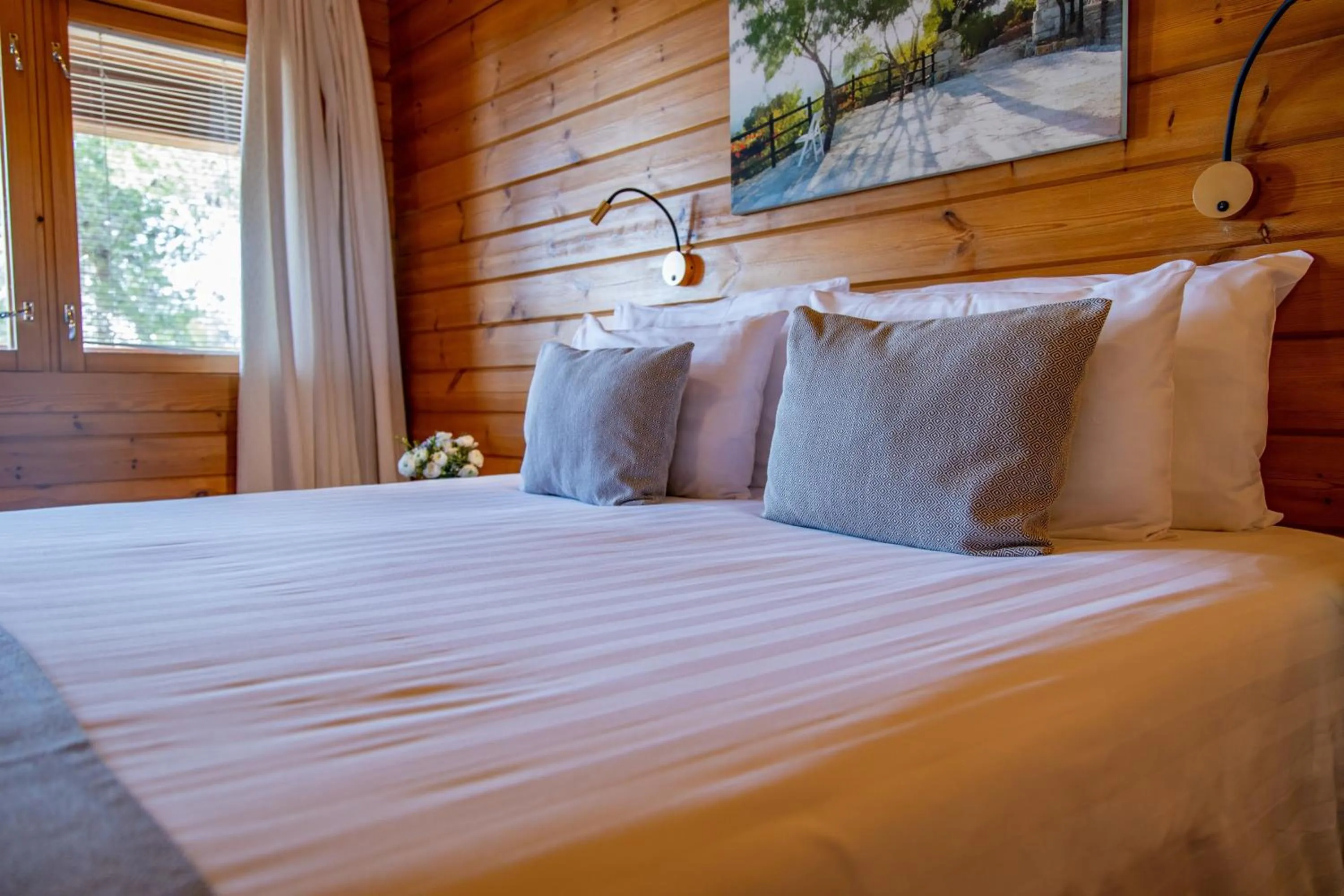 Bed in Logos hotel in Yad Hashmona