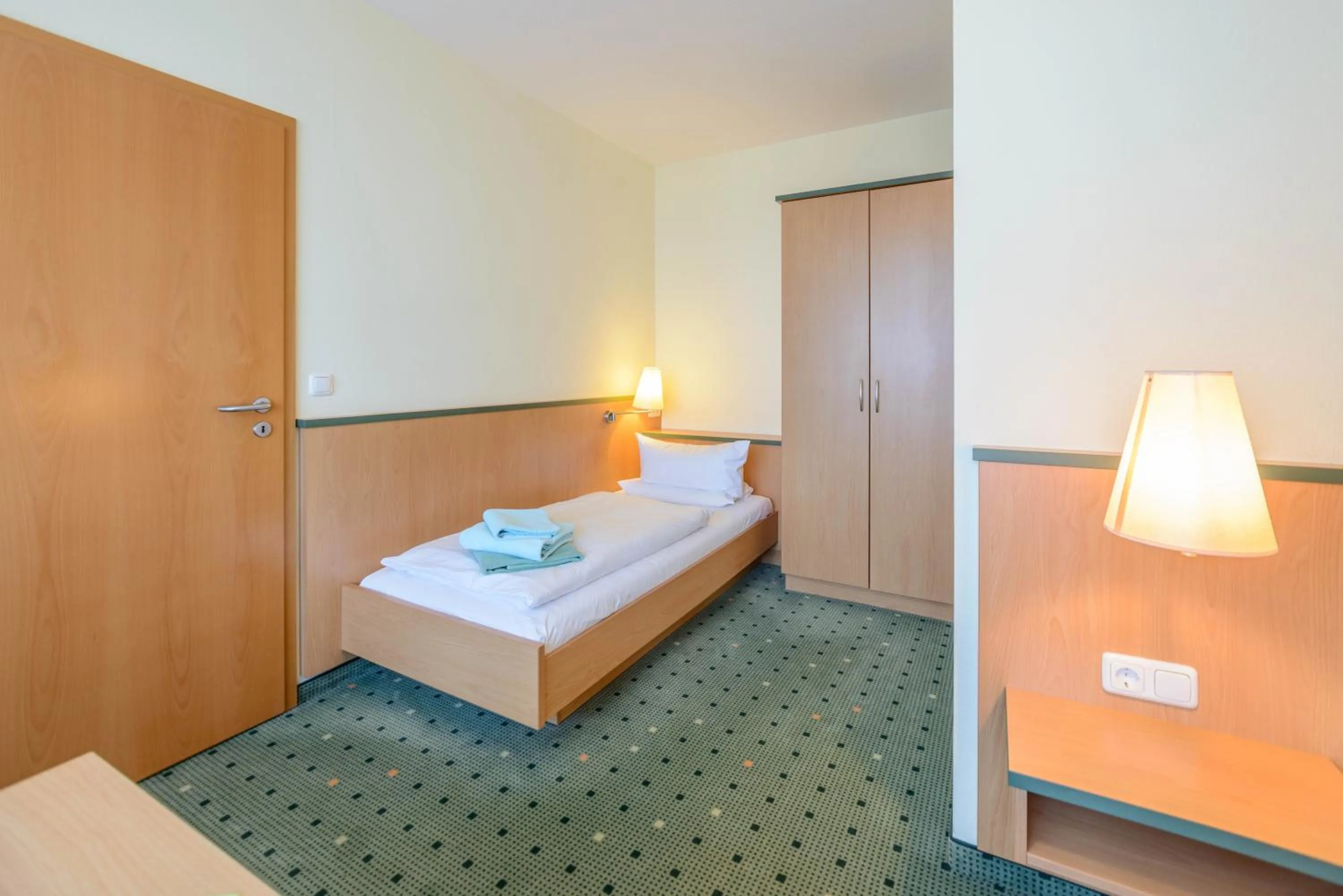 Photo of the whole room, Bed in Am Weststrand Aparthotel Kühlungsborn