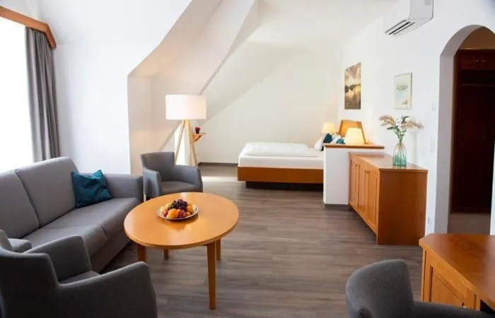 Living room, Bed in Gasthof zur Post Oberwirt