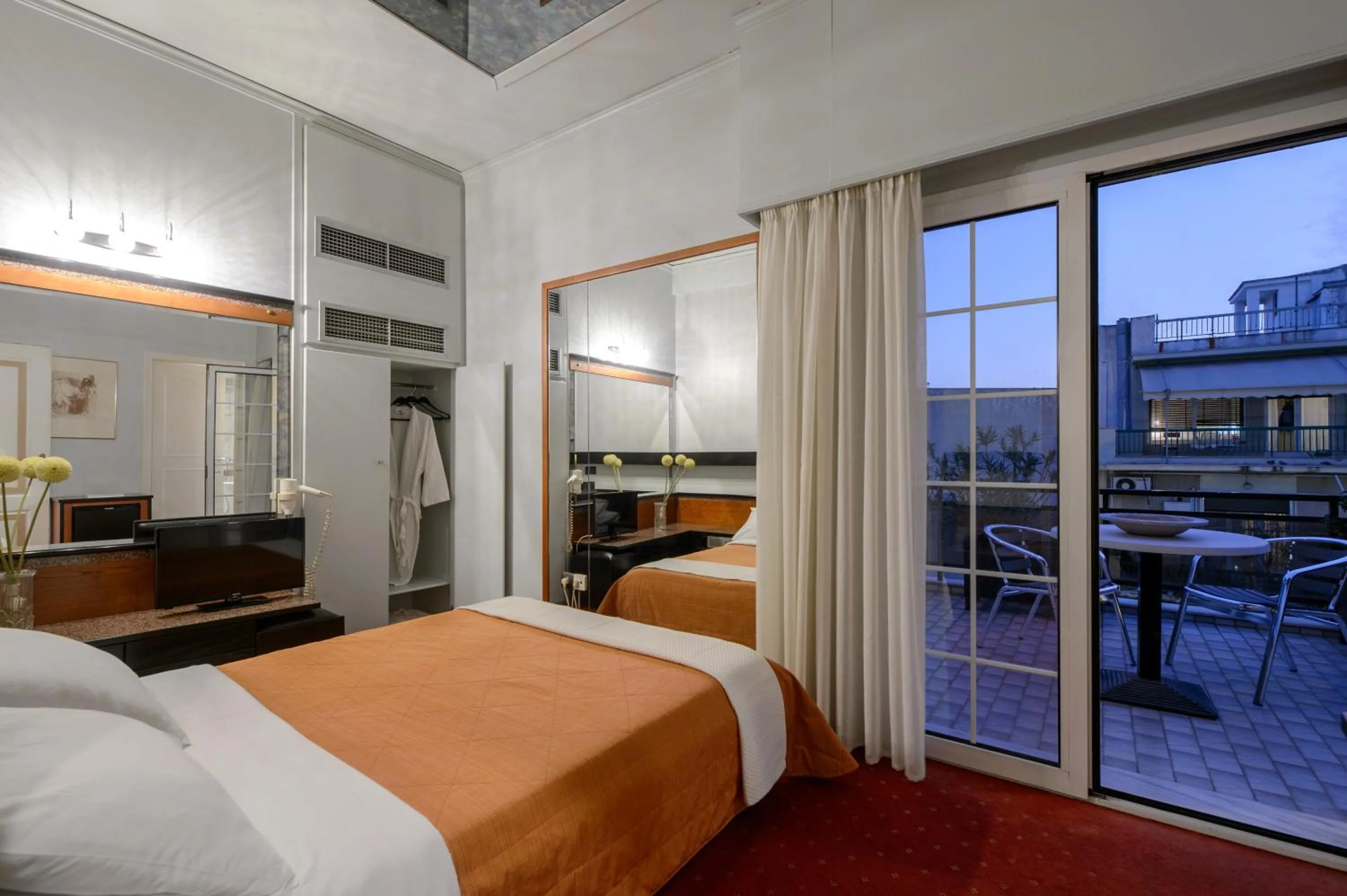 Bed in Victory Inn Hotel