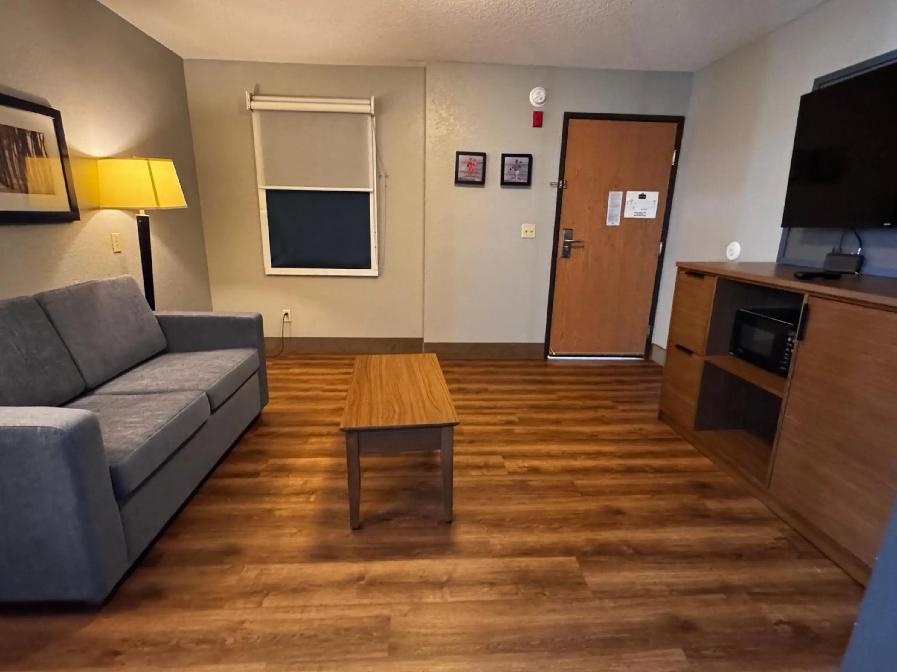 Living room in AmericInn by Wyndham White Bear Lake St. Paul Living room in AmericInn by Wyndham White Bear Lake St. Paul