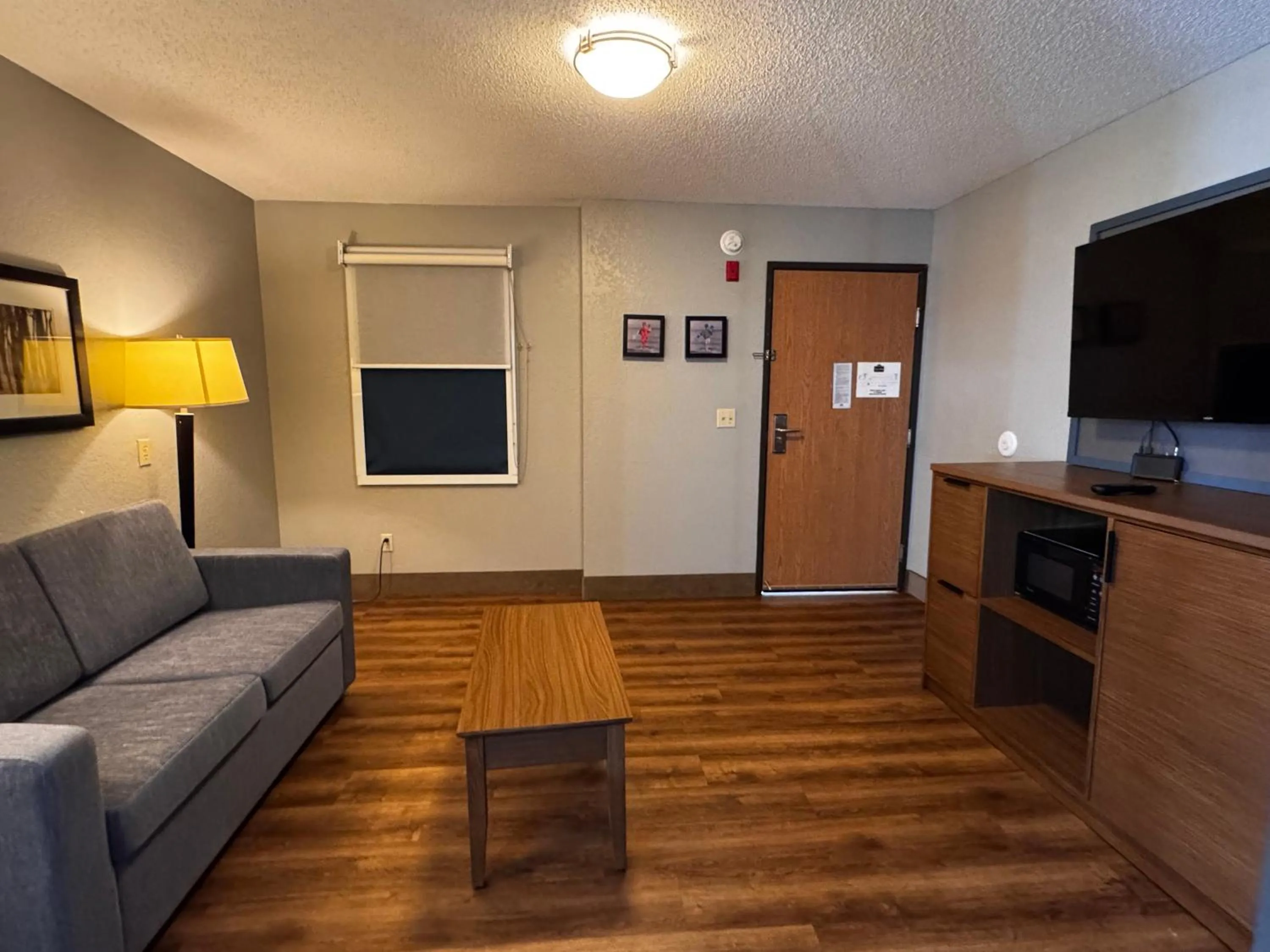 Living room in AmericInn by Wyndham White Bear Lake St. Paul