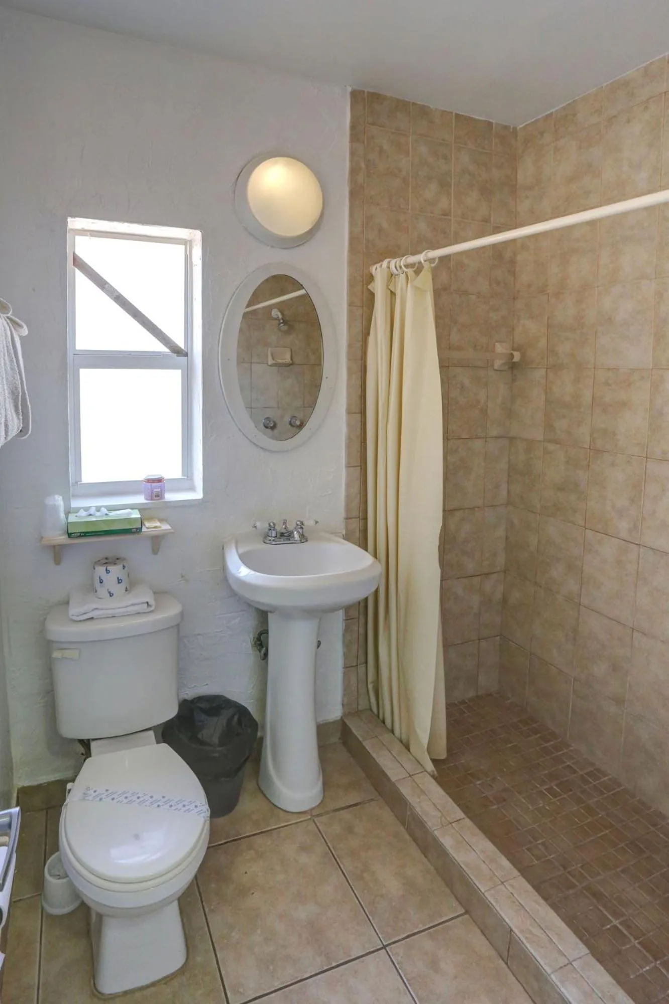 Shower in Richard's Motel Courtyard