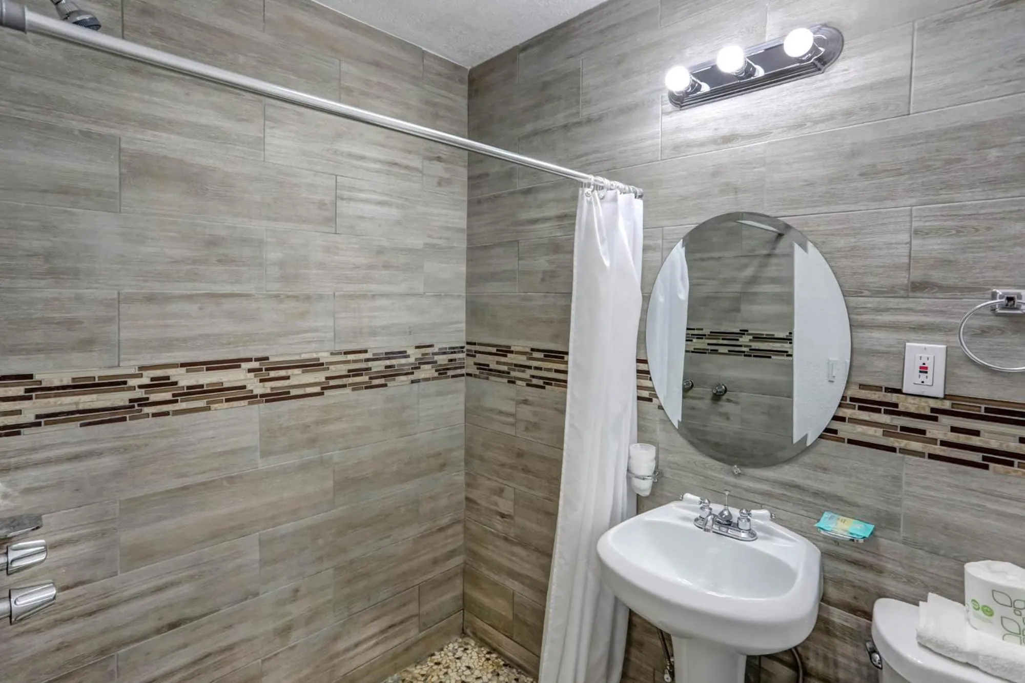 Shower in Richard's Motel Courtyard