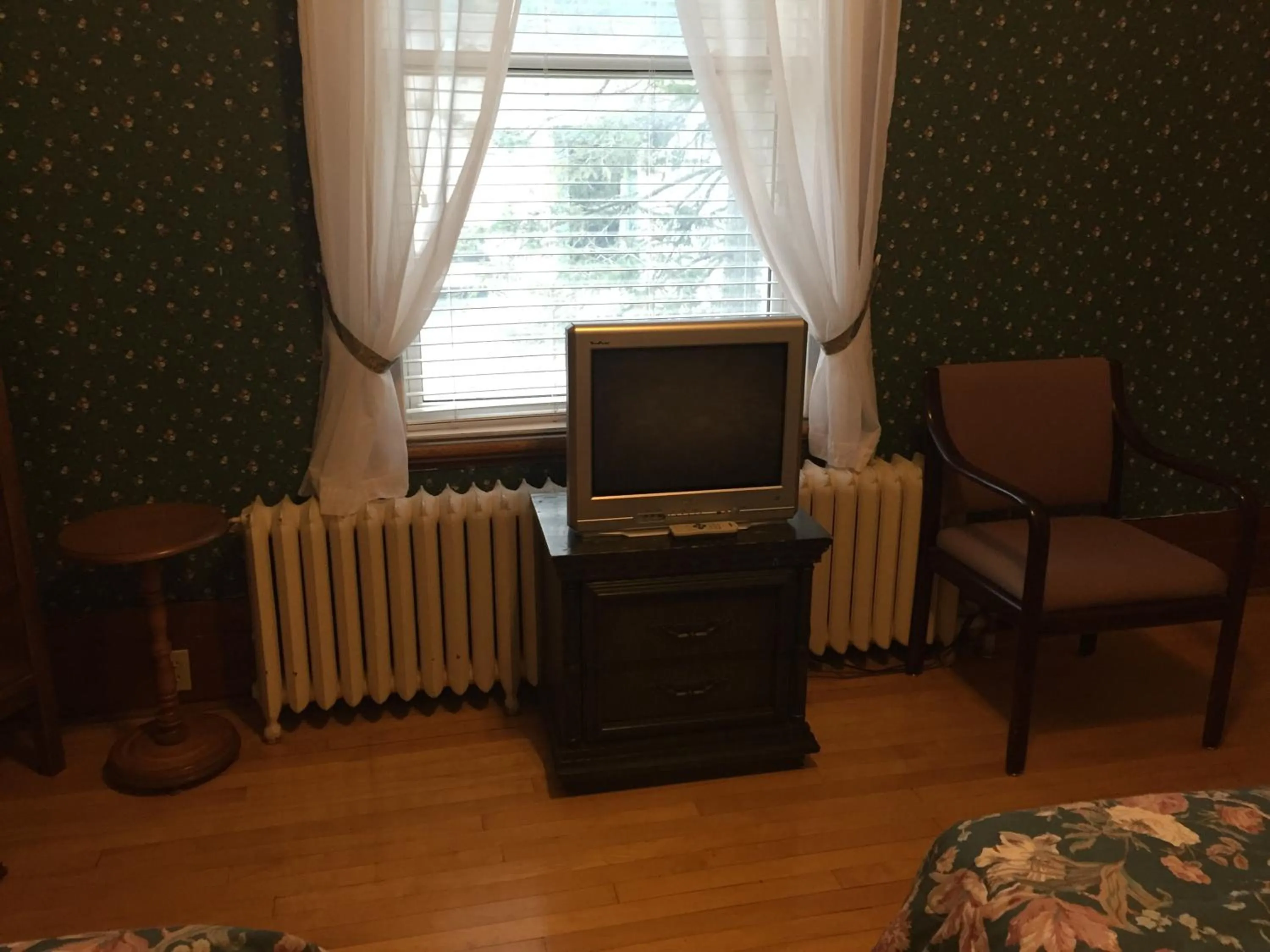 Bedroom in Le Petit Château Montebello B&B