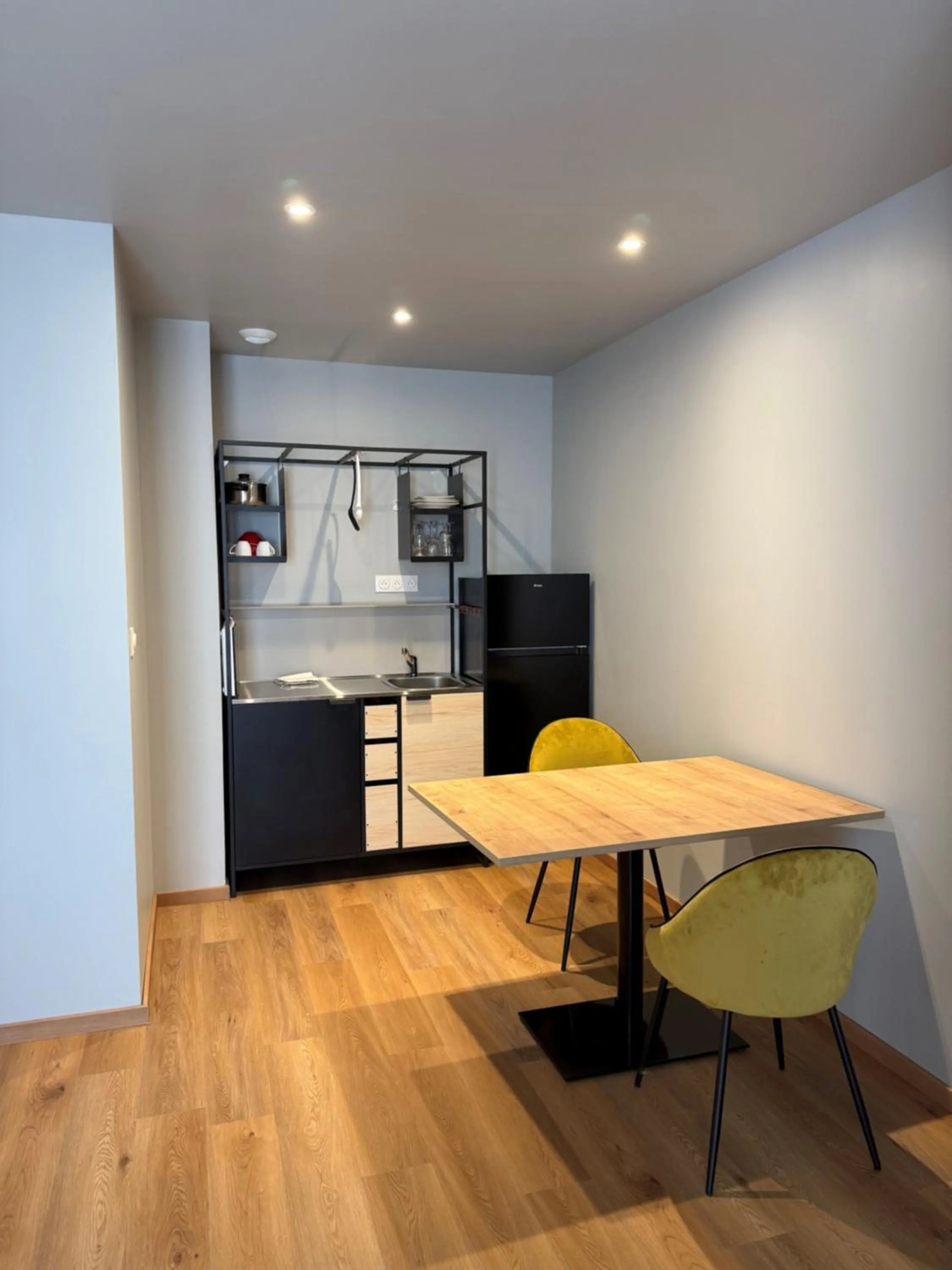 Kitchen or kitchenette in Tulip Inn Honfleur Residence &amp; Spa