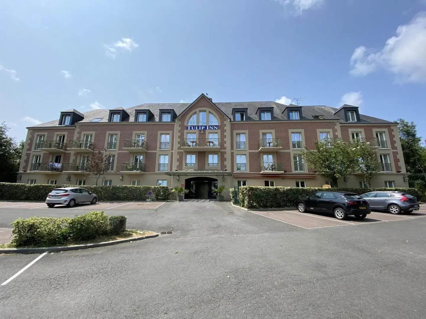Property building in Tulip Inn Honfleur Residence & Spa Property building in Tulip Inn Honfleur Residence & Spa