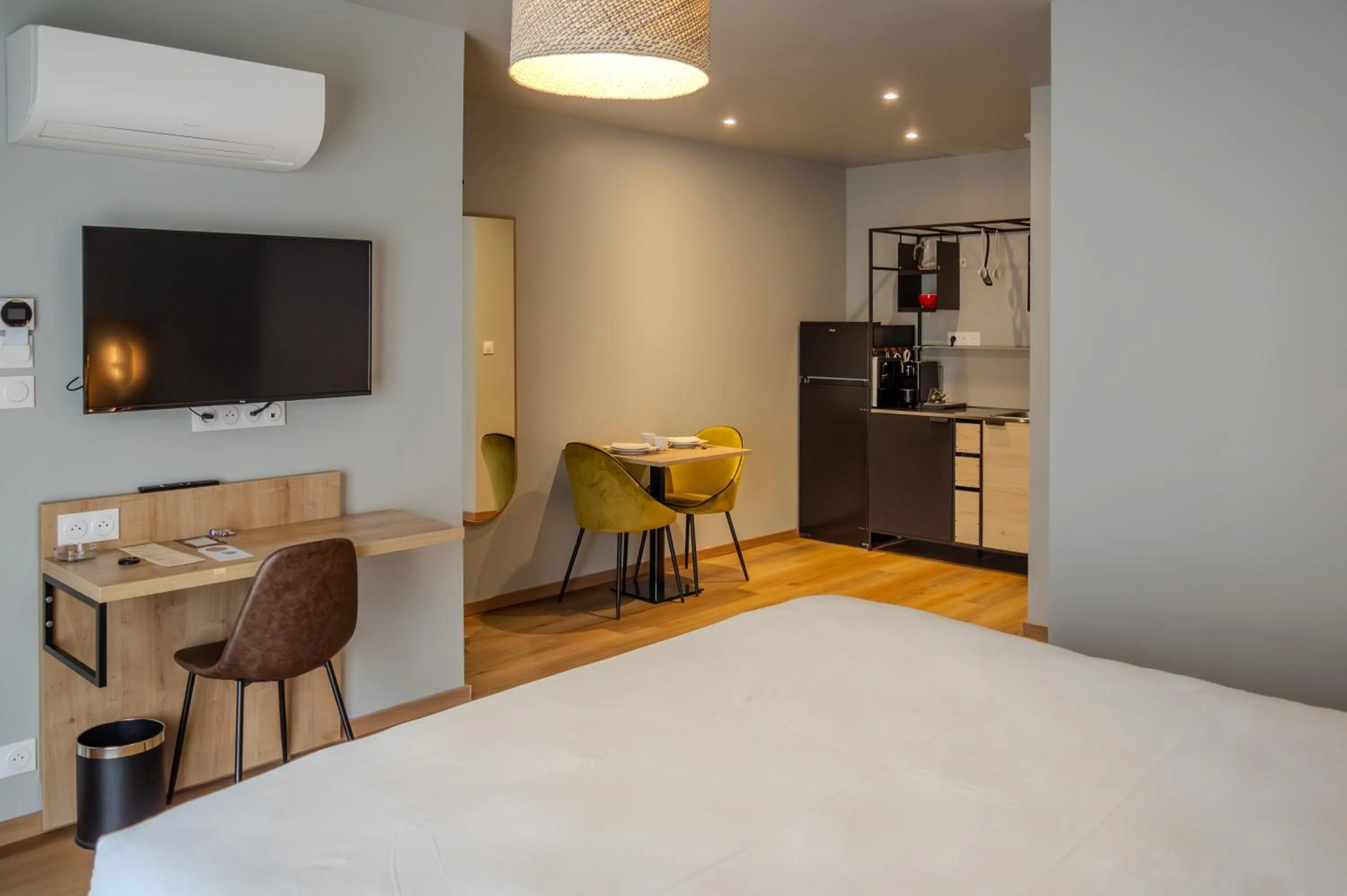 Bed in Tulip Inn Honfleur Residence & Spa