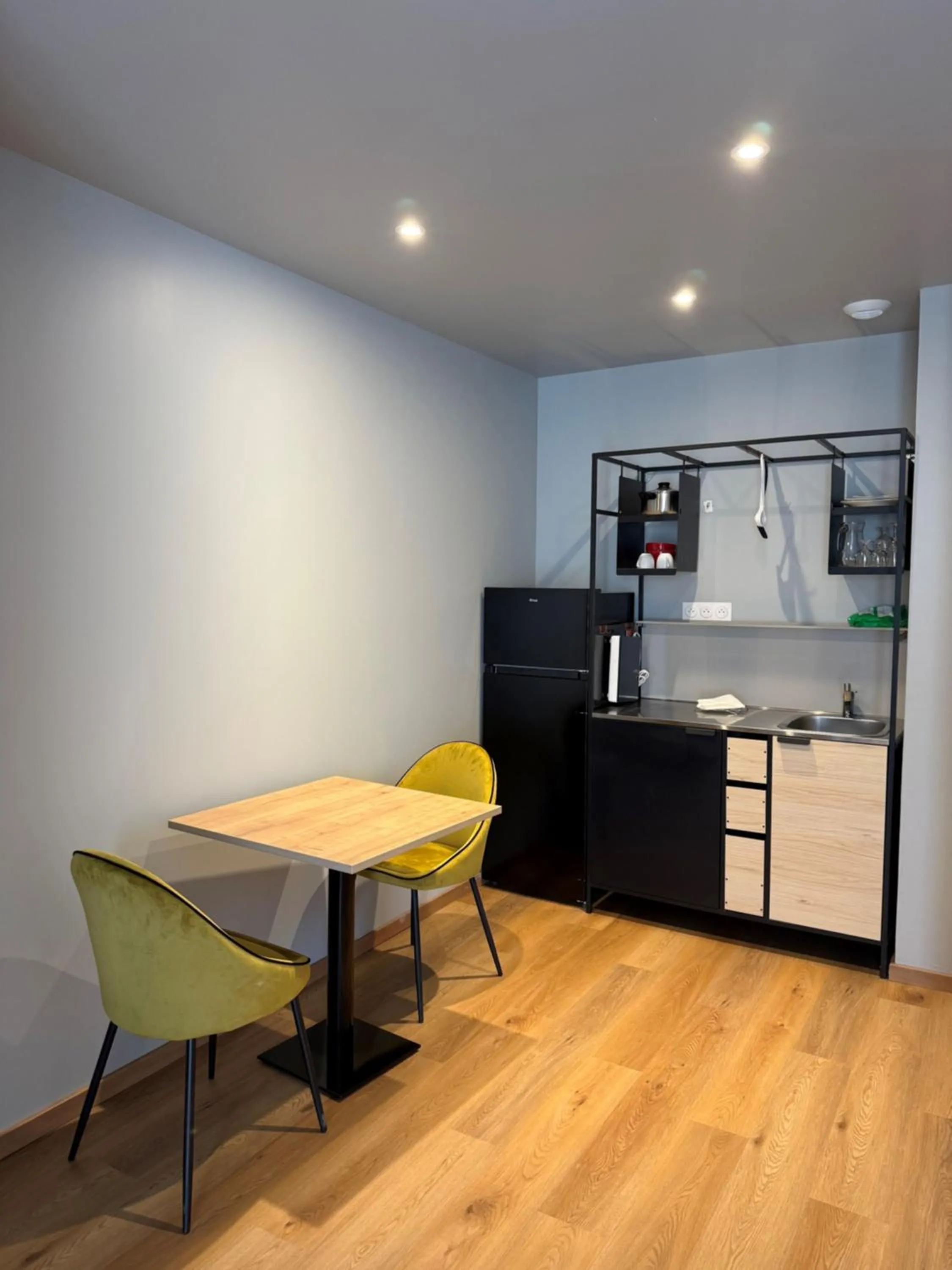 Kitchen or kitchenette in Tulip Inn Honfleur Residence &amp; Spa