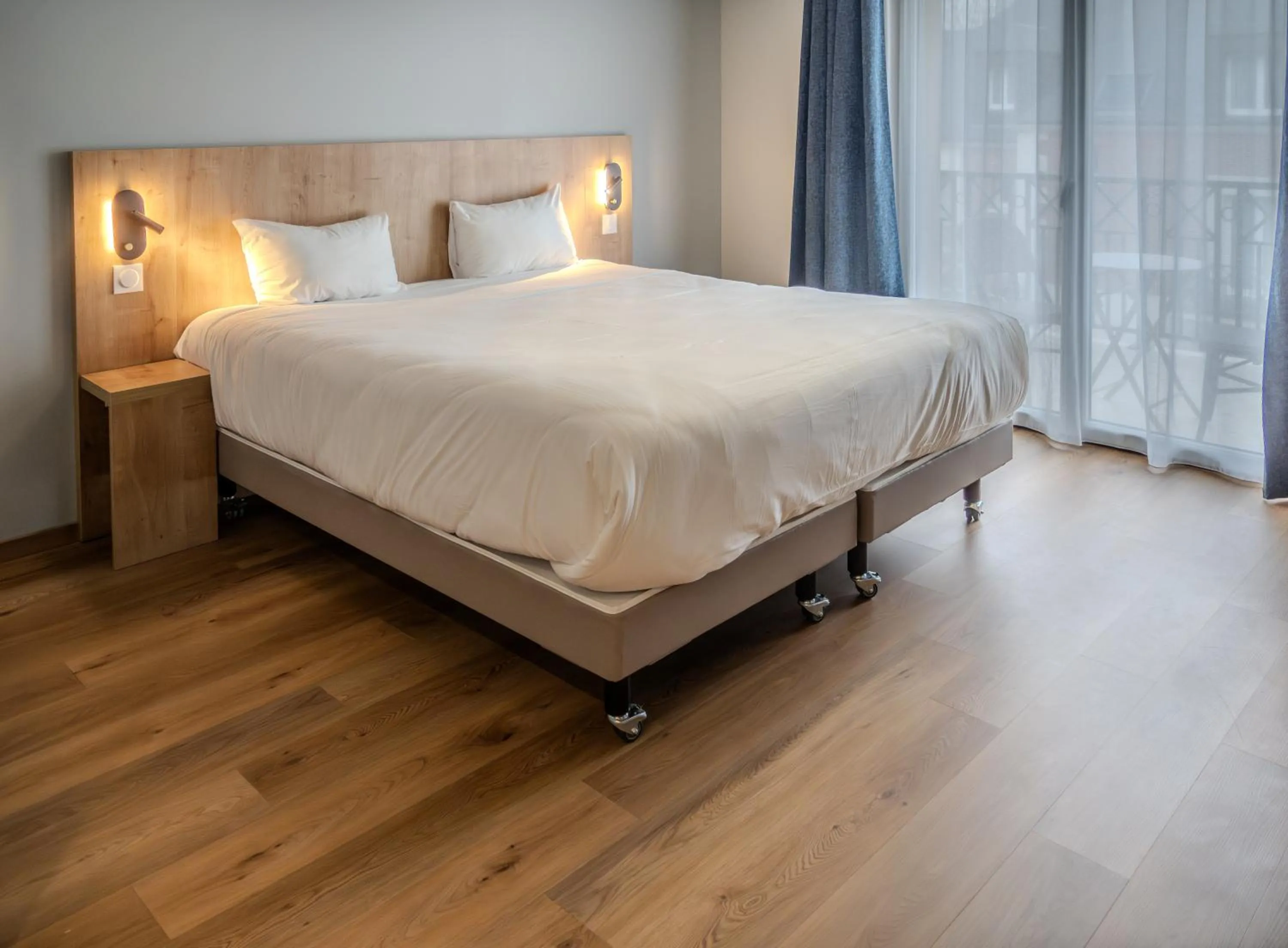 Bed in Tulip Inn Honfleur Residence & Spa