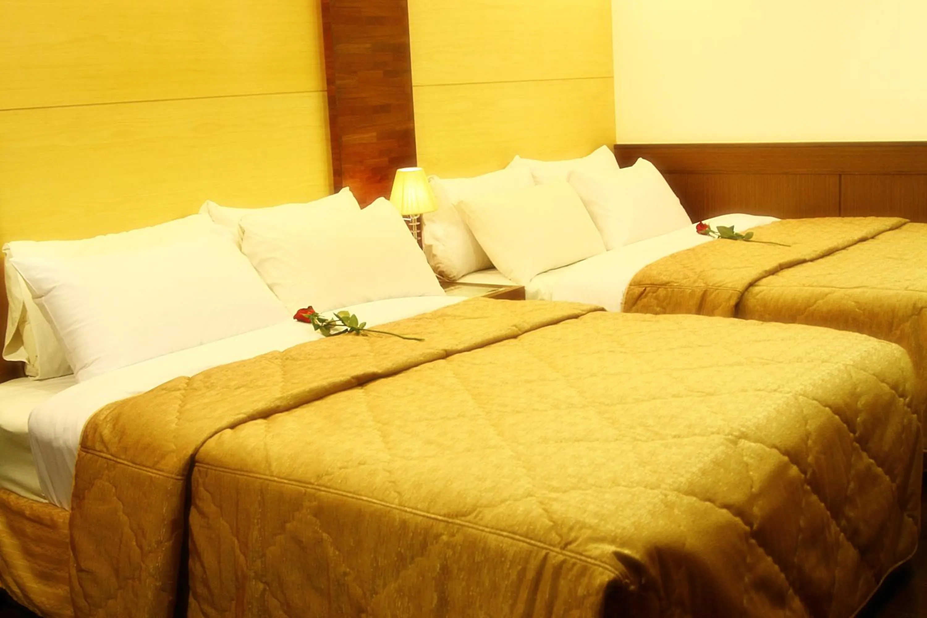 Bed in Gau Shan Ching Hotel