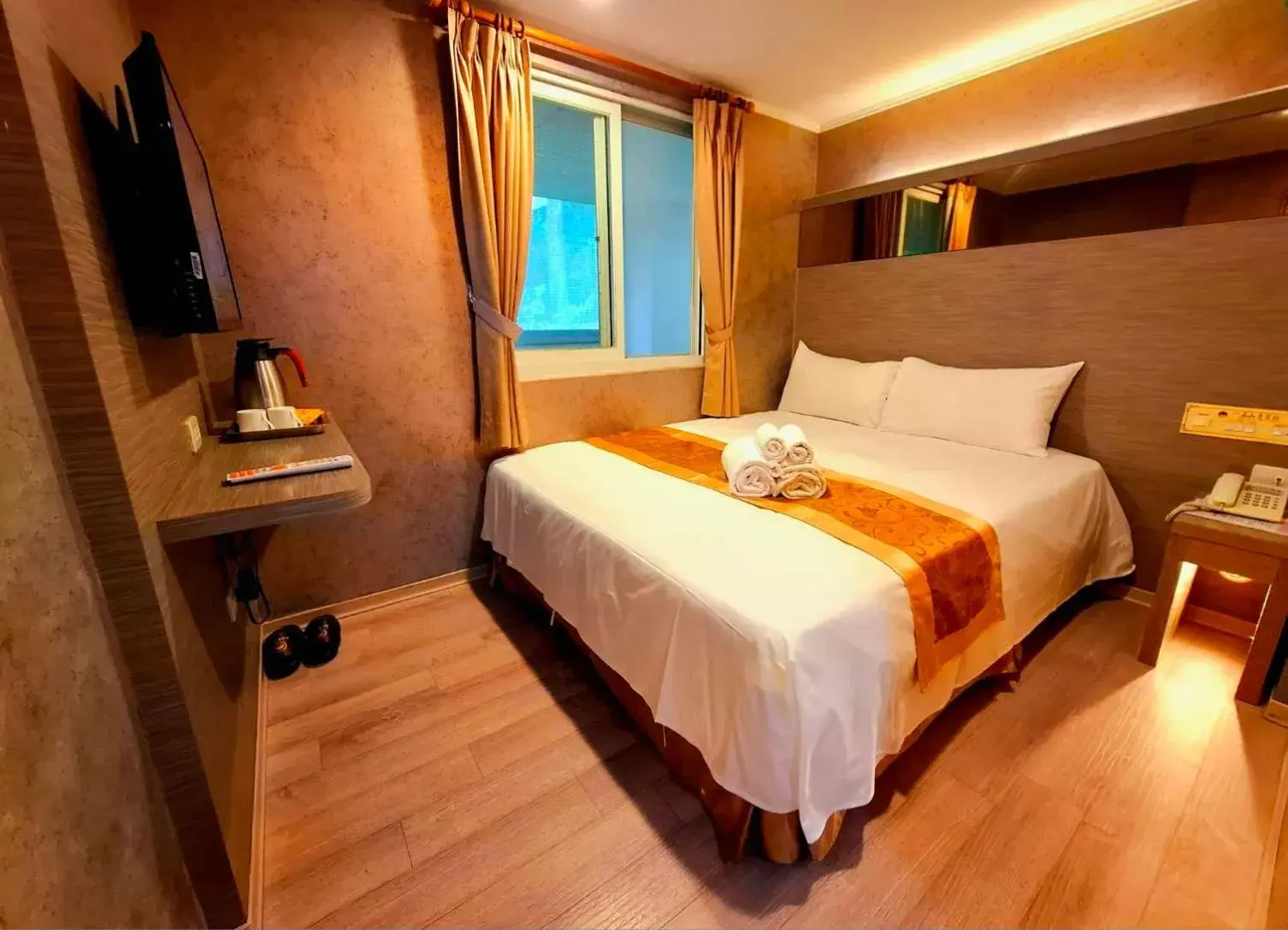 Bed in Gau Shan Ching Hotel Bed in Gau Shan Ching Hotel