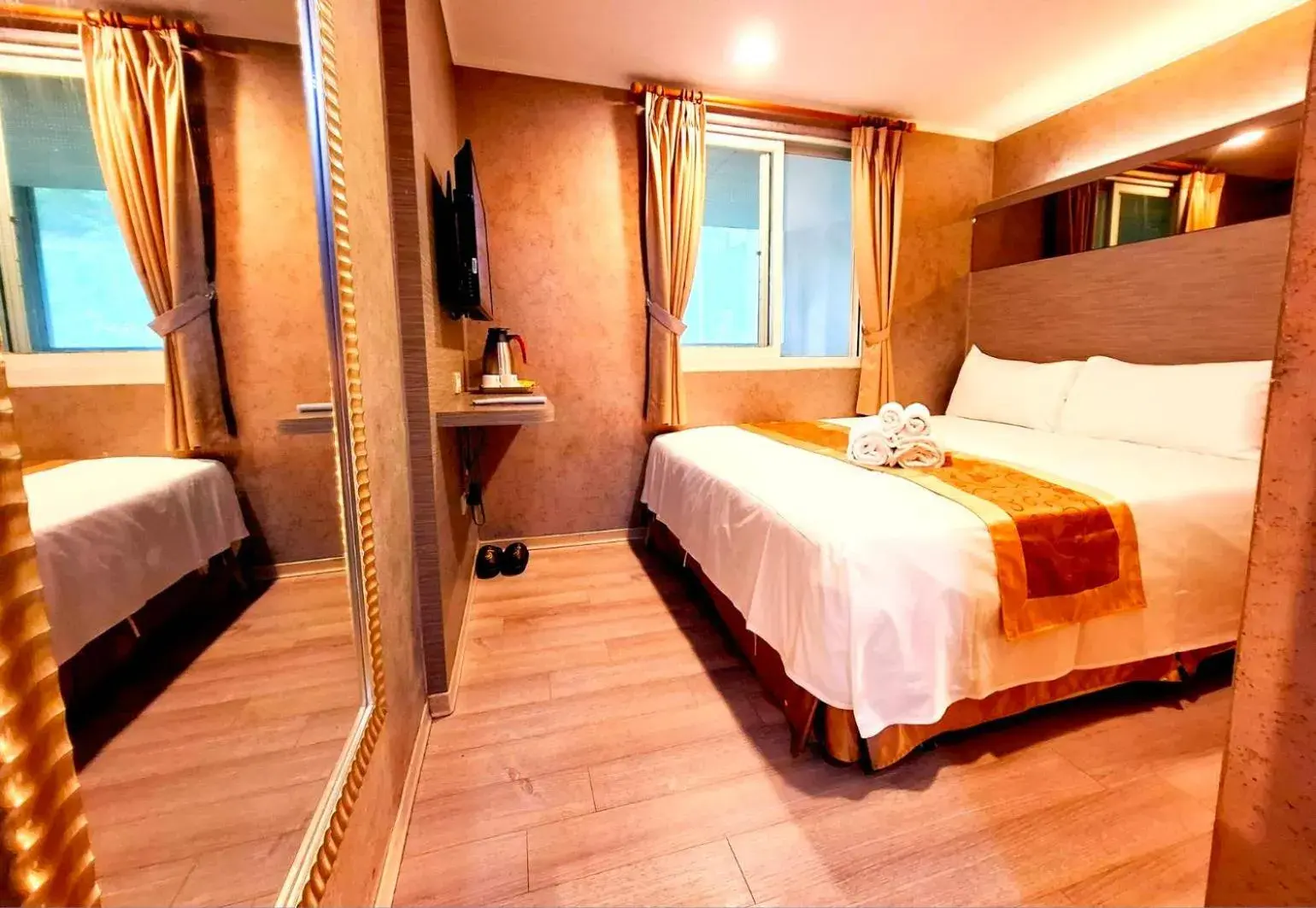 Bed in Gau Shan Ching Hotel Bed in Gau Shan Ching Hotel