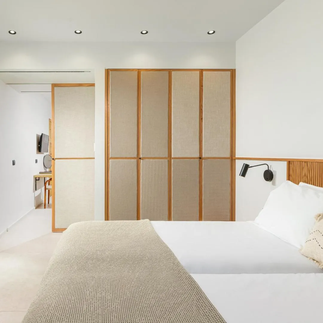 Bed in Caravia Beach Hotel