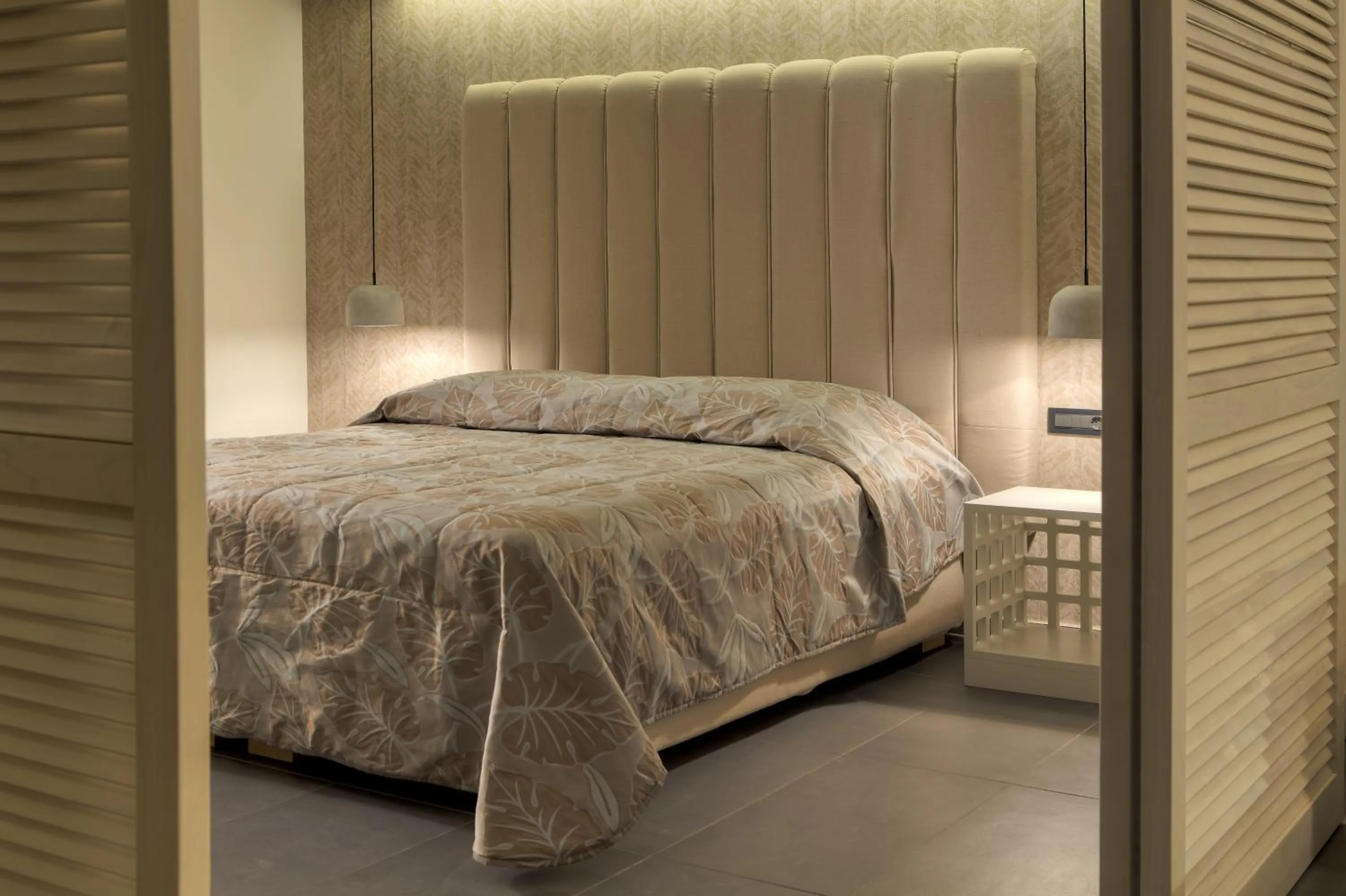 Bed in Caravia Beach Hotel