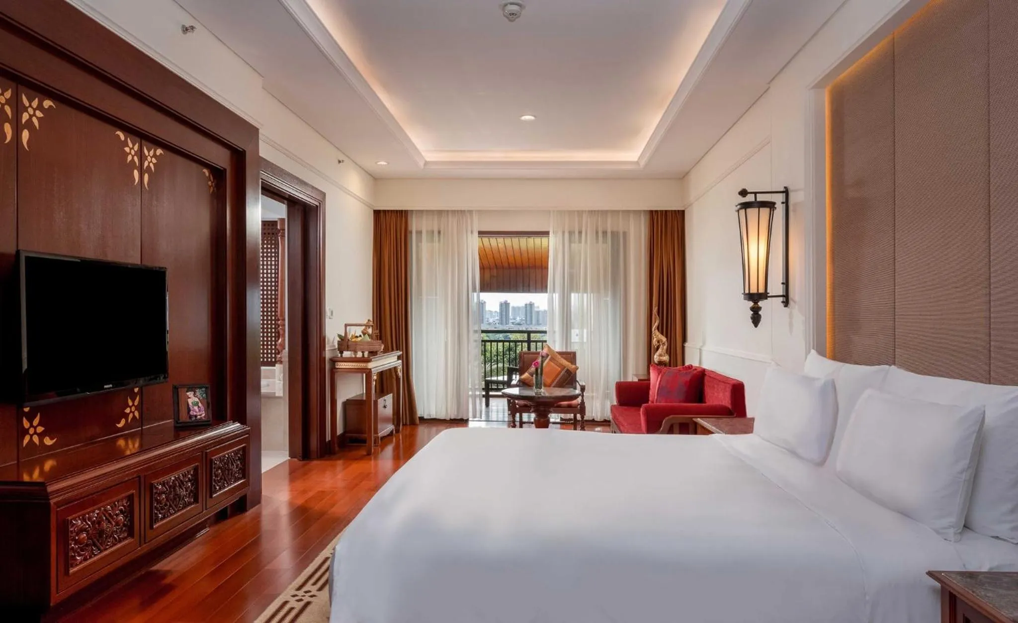 Photo of the whole room, Bed in InterContinental Xishuangbanna Resort by IHG