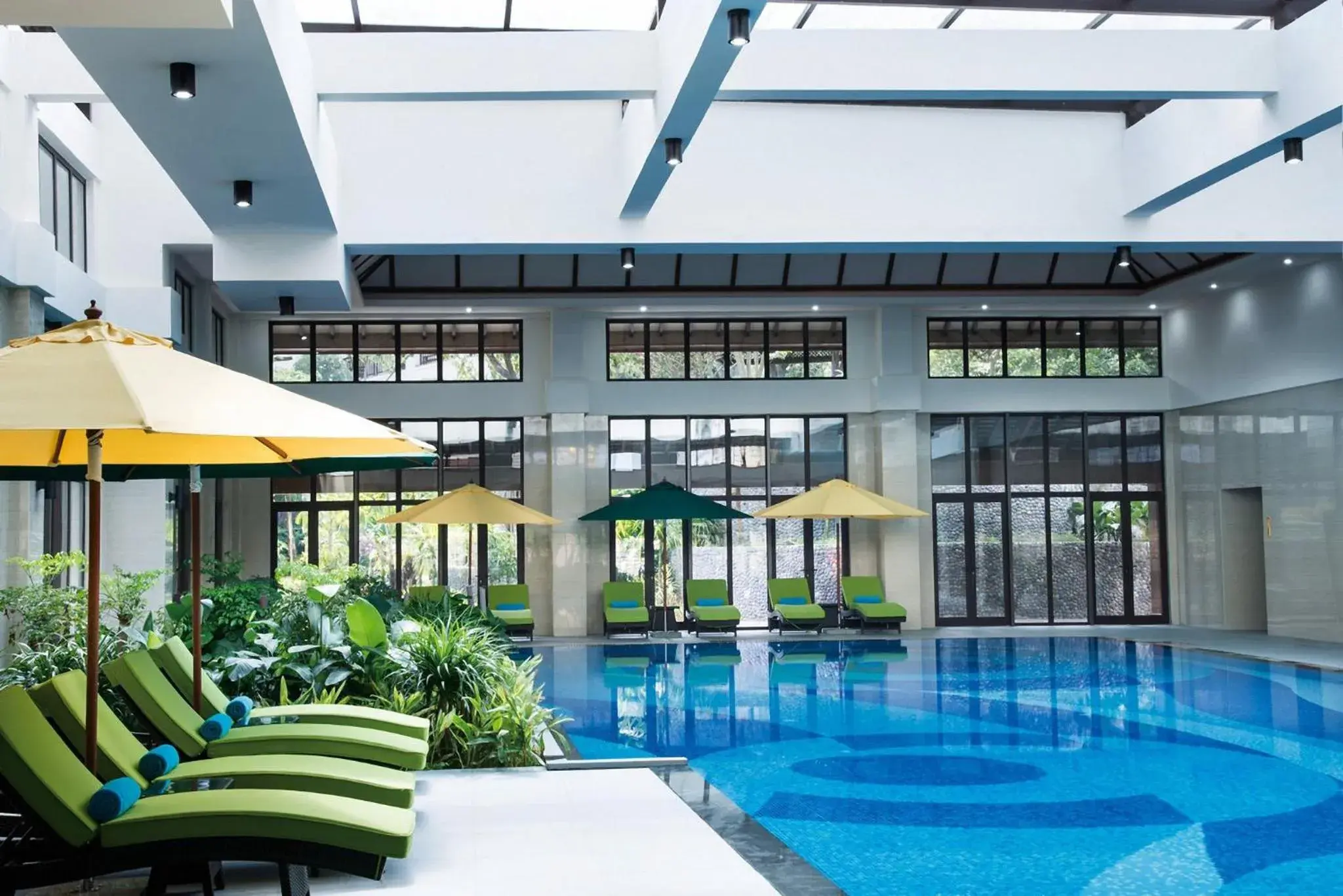 Swimming pool in InterContinental Xishuangbanna Resort by IHG Swimming pool in InterContinental Xishuangbanna Resort by IHG