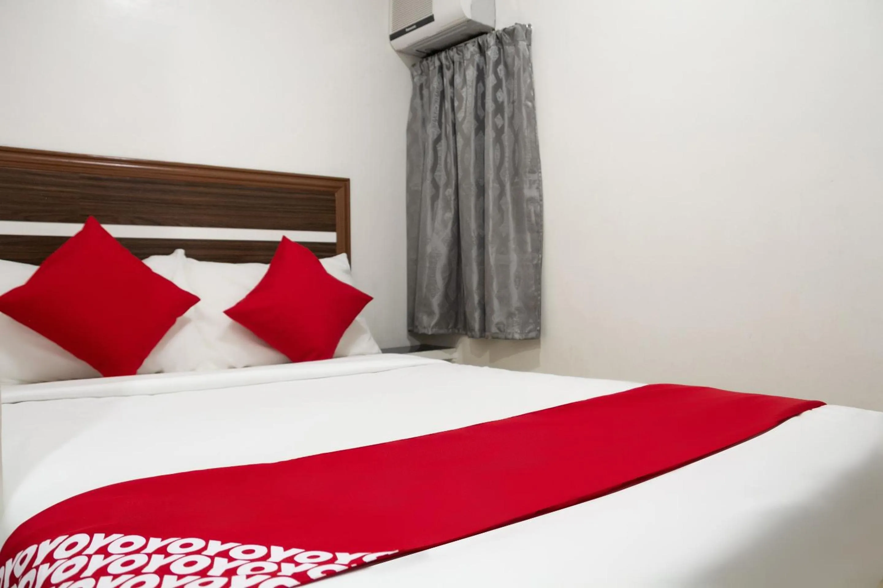 Bedroom in Circle-b Apartelle & Suites