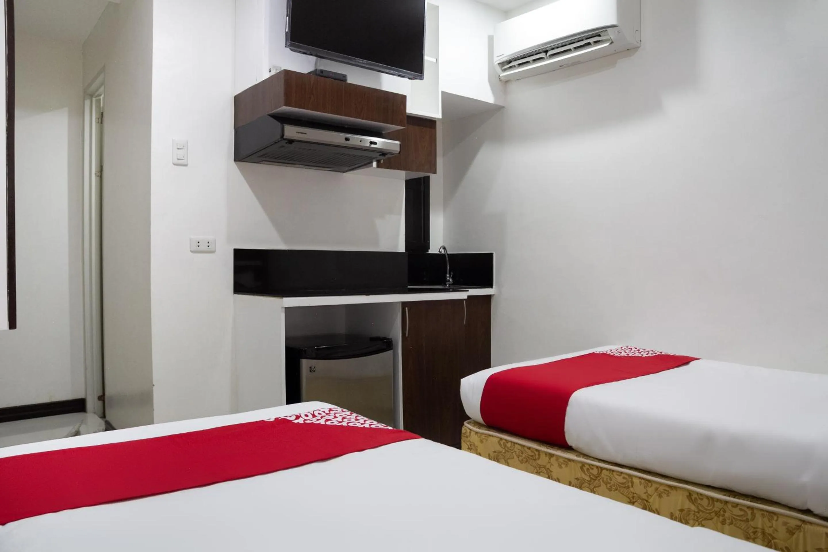 Bedroom in Circle-b Apartelle & Suites