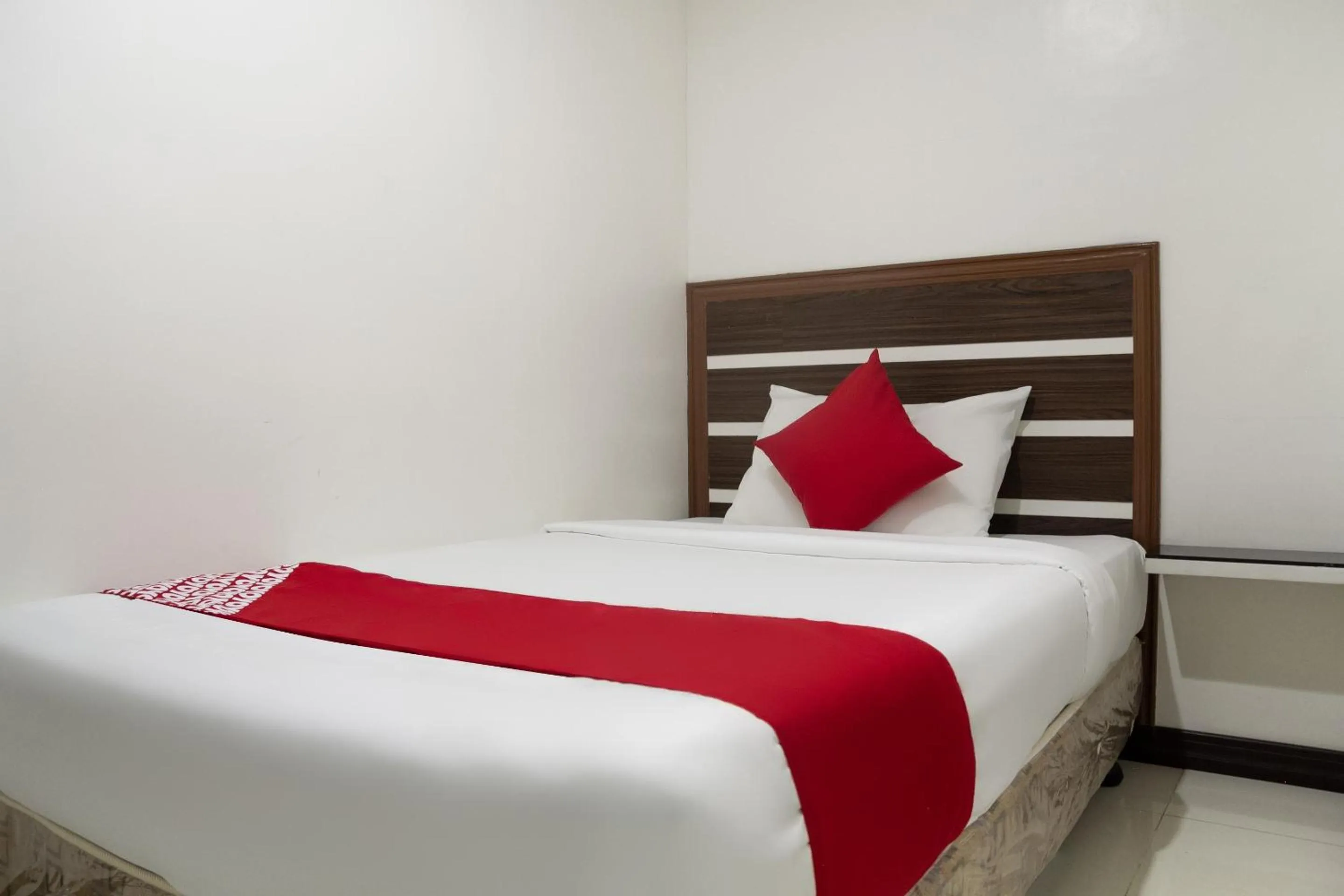 Bedroom in Circle-b Apartelle & Suites