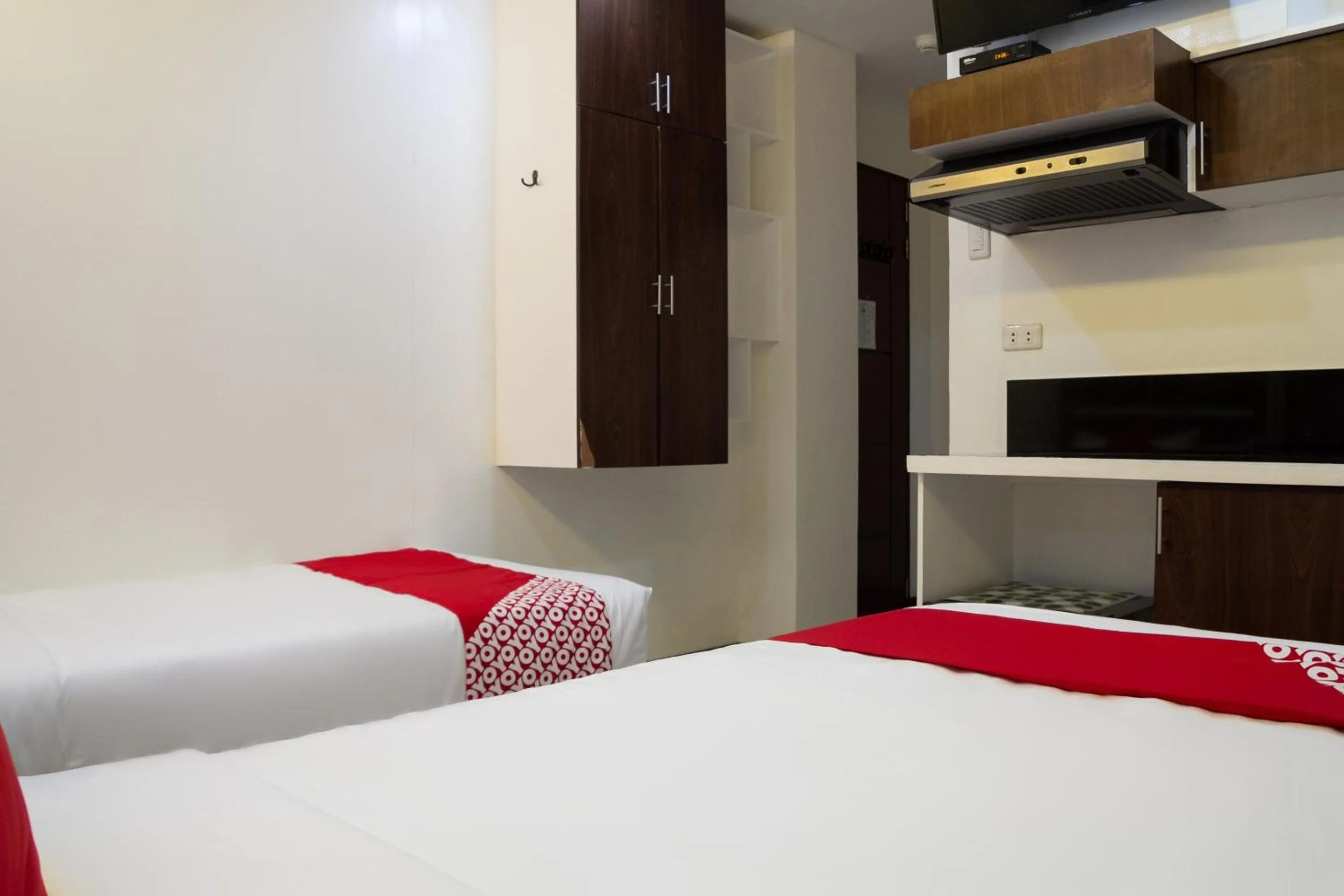 Bedroom in Circle-b Apartelle & Suites