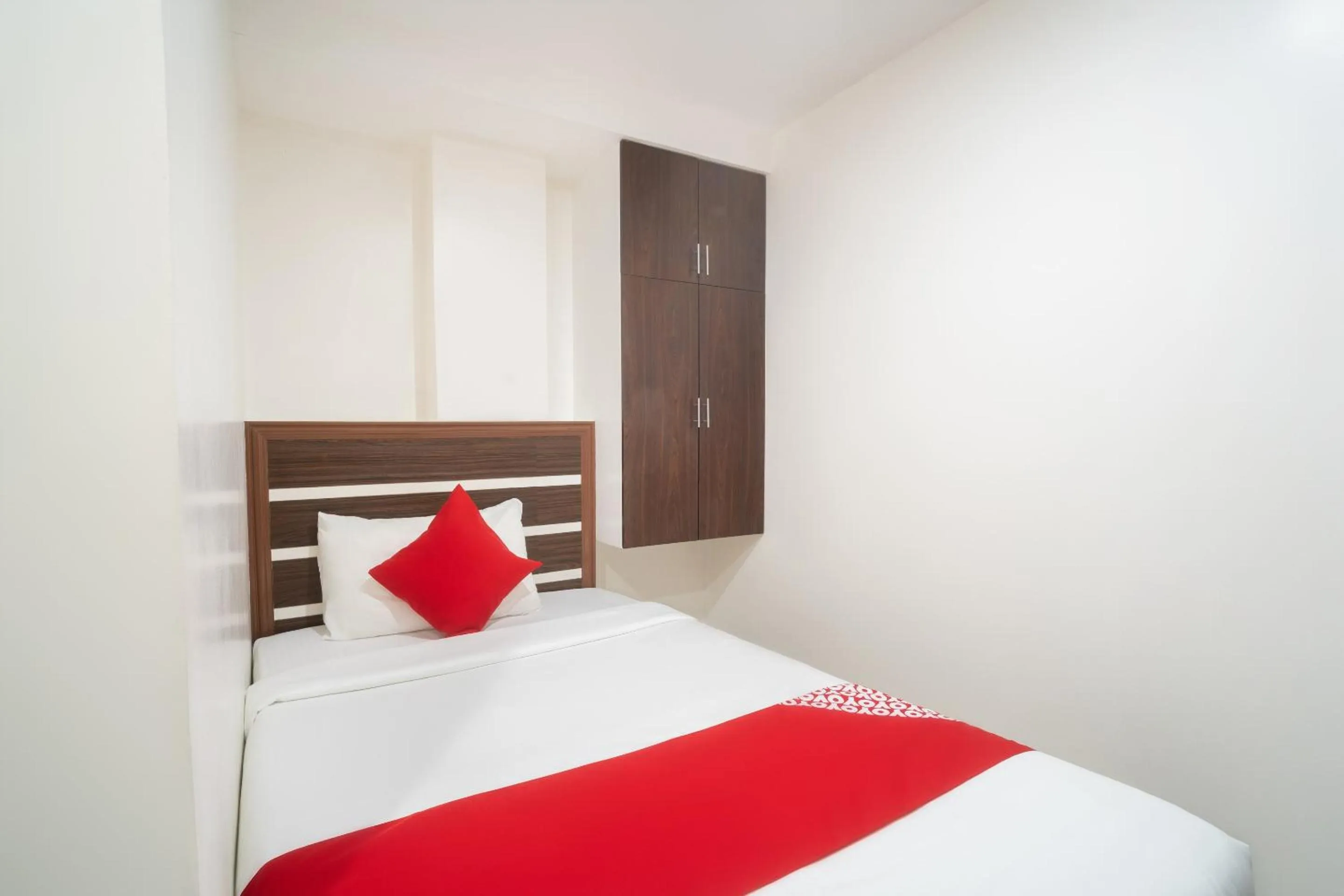 Bedroom in Circle-b Apartelle & Suites