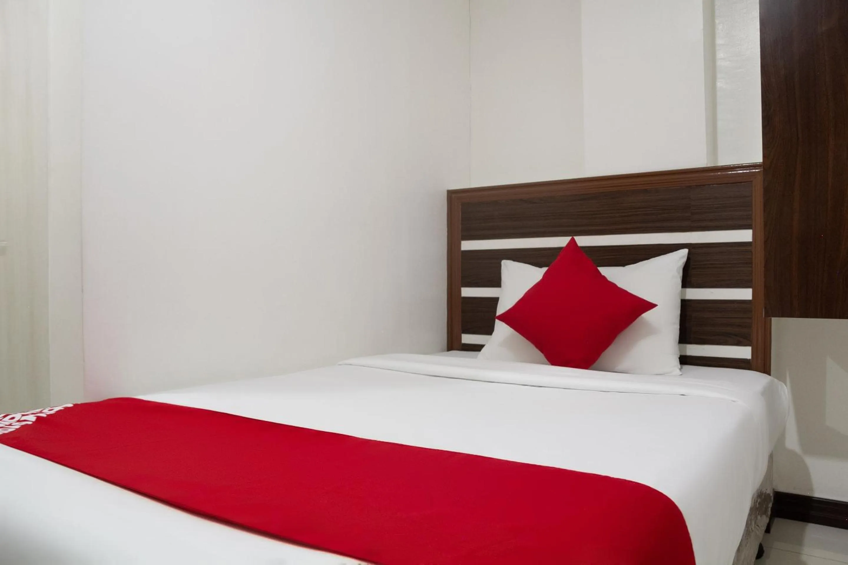 Bedroom in Circle-b Apartelle & Suites