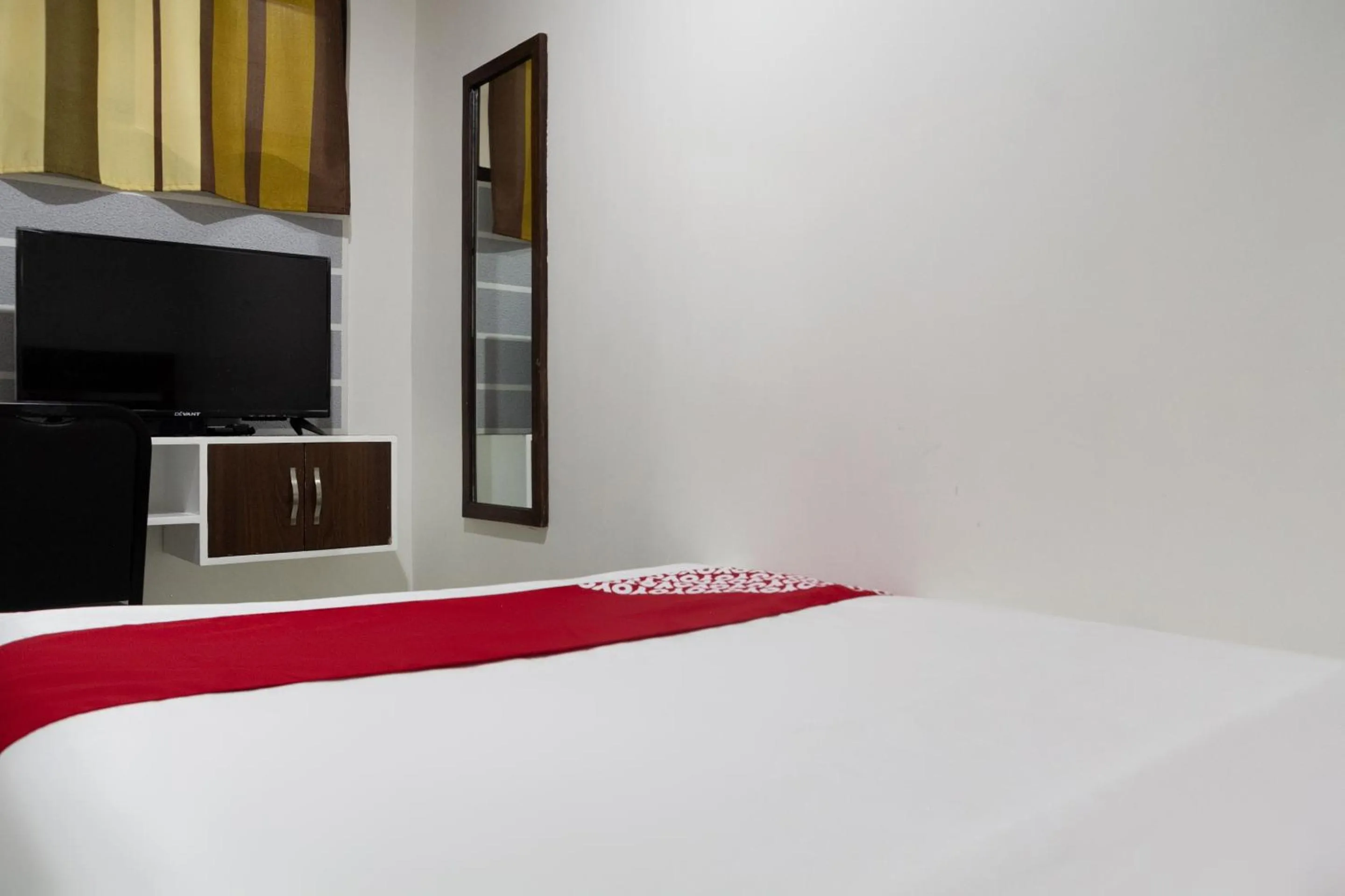 Bedroom in Circle-b Apartelle & Suites