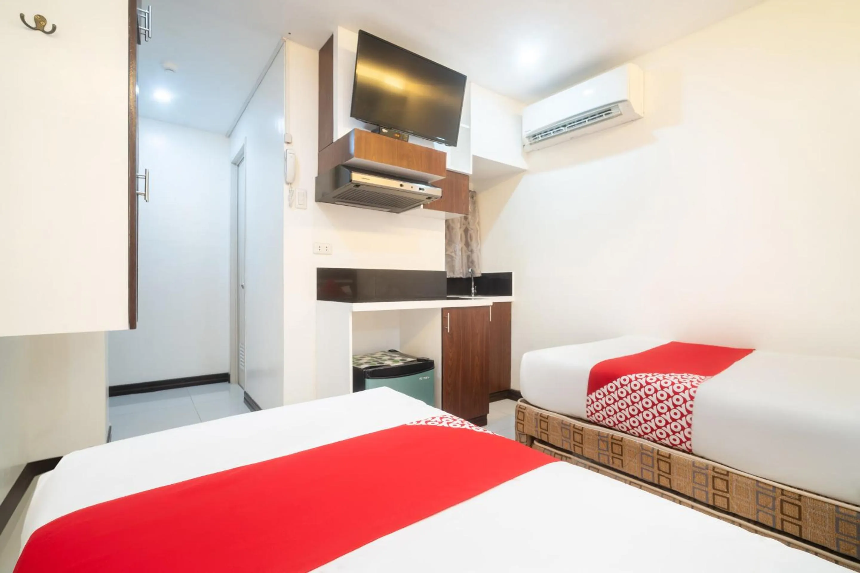 Bedroom in Circle-b Apartelle & Suites