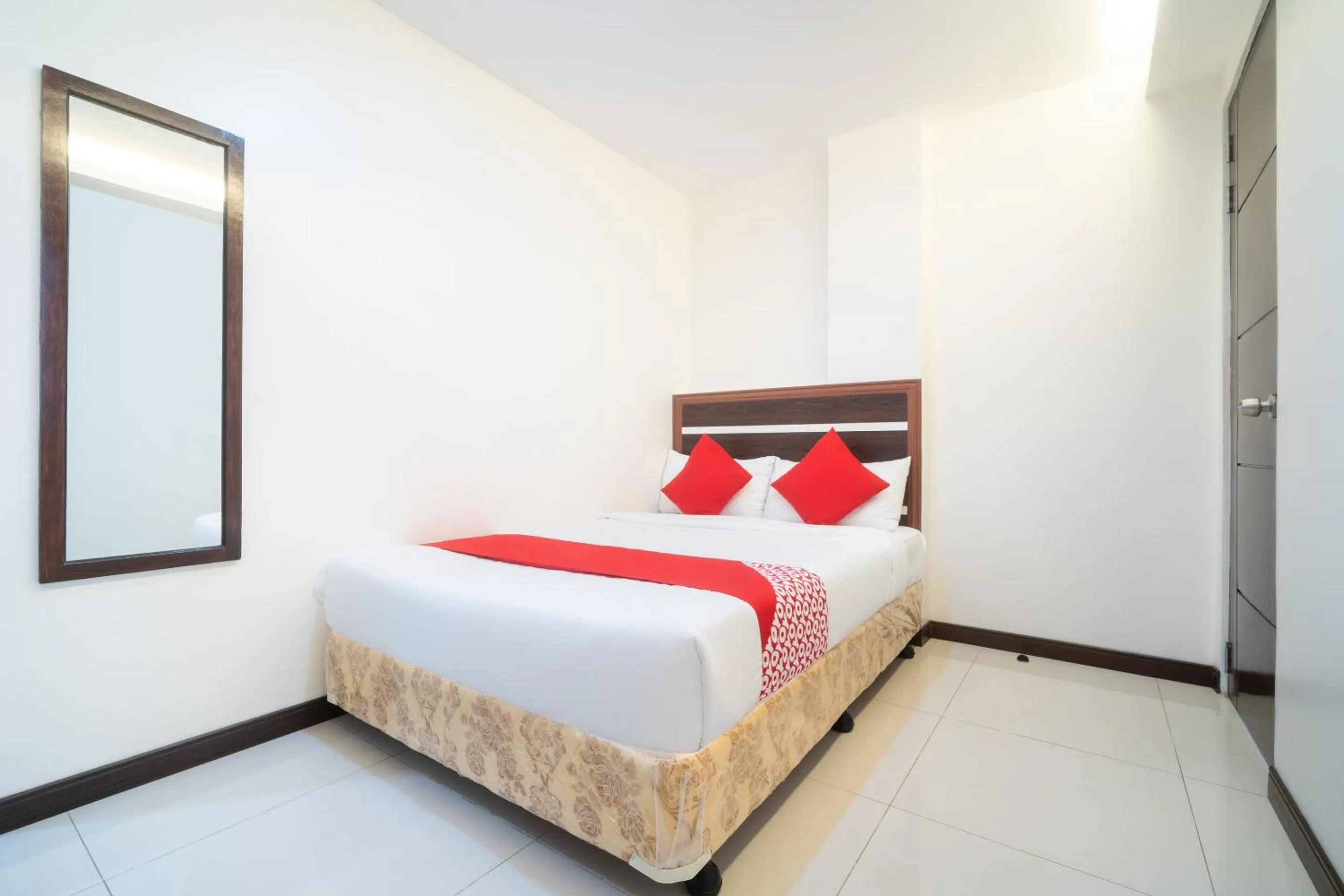 Bedroom in Circle-b Apartelle & Suites