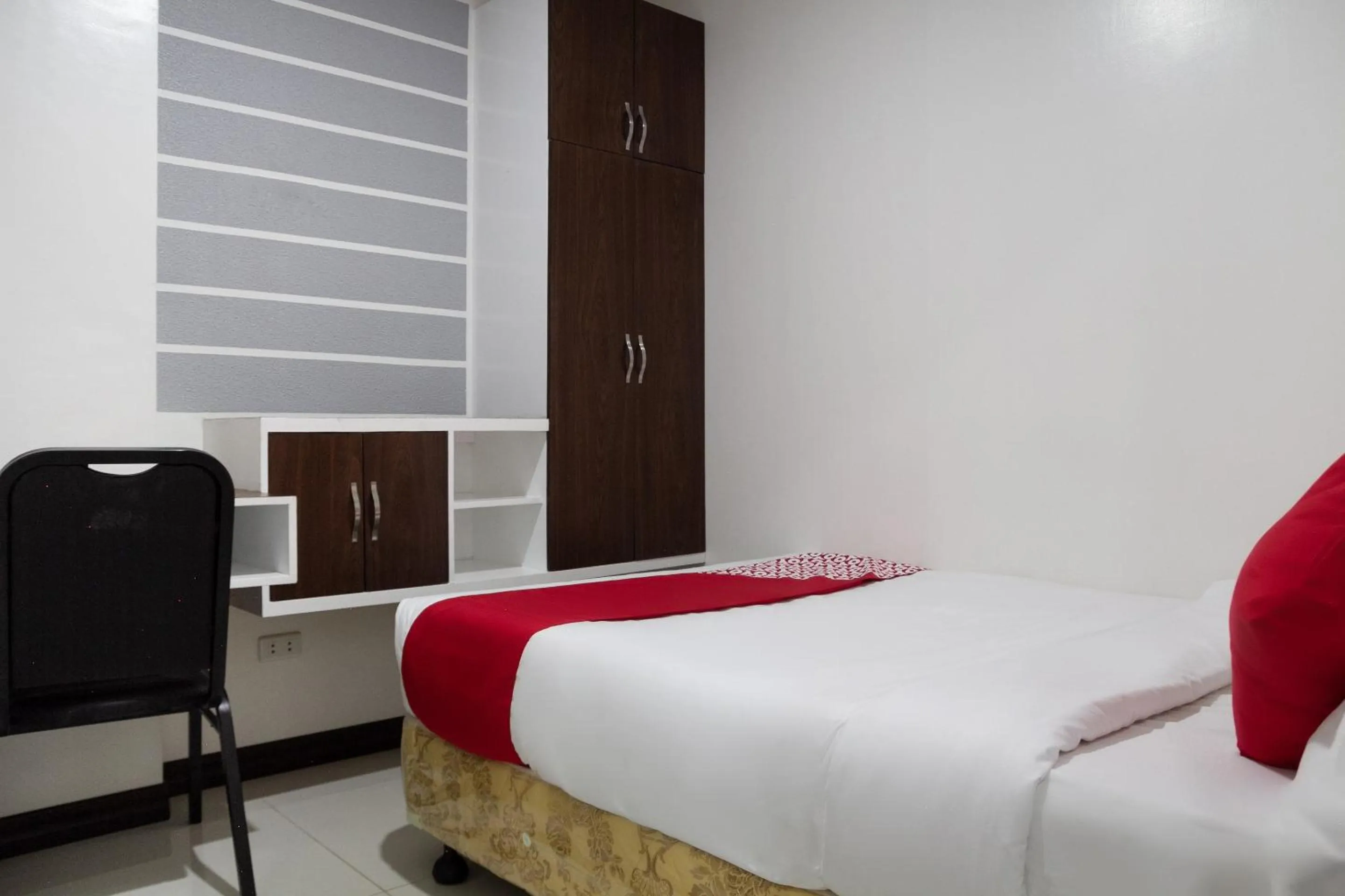 Bedroom in Circle-b Apartelle & Suites