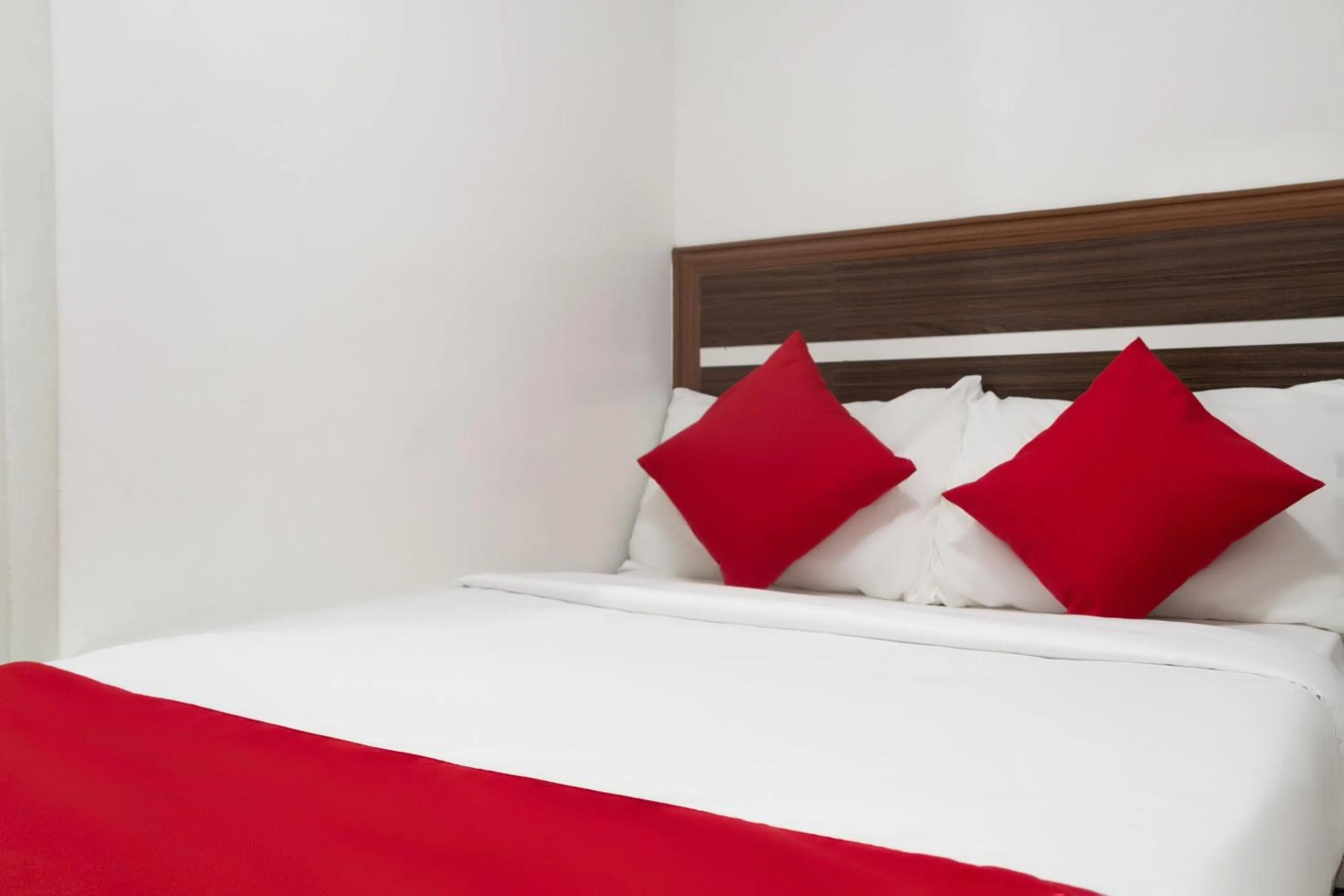 Bedroom in Circle-b Apartelle & Suites