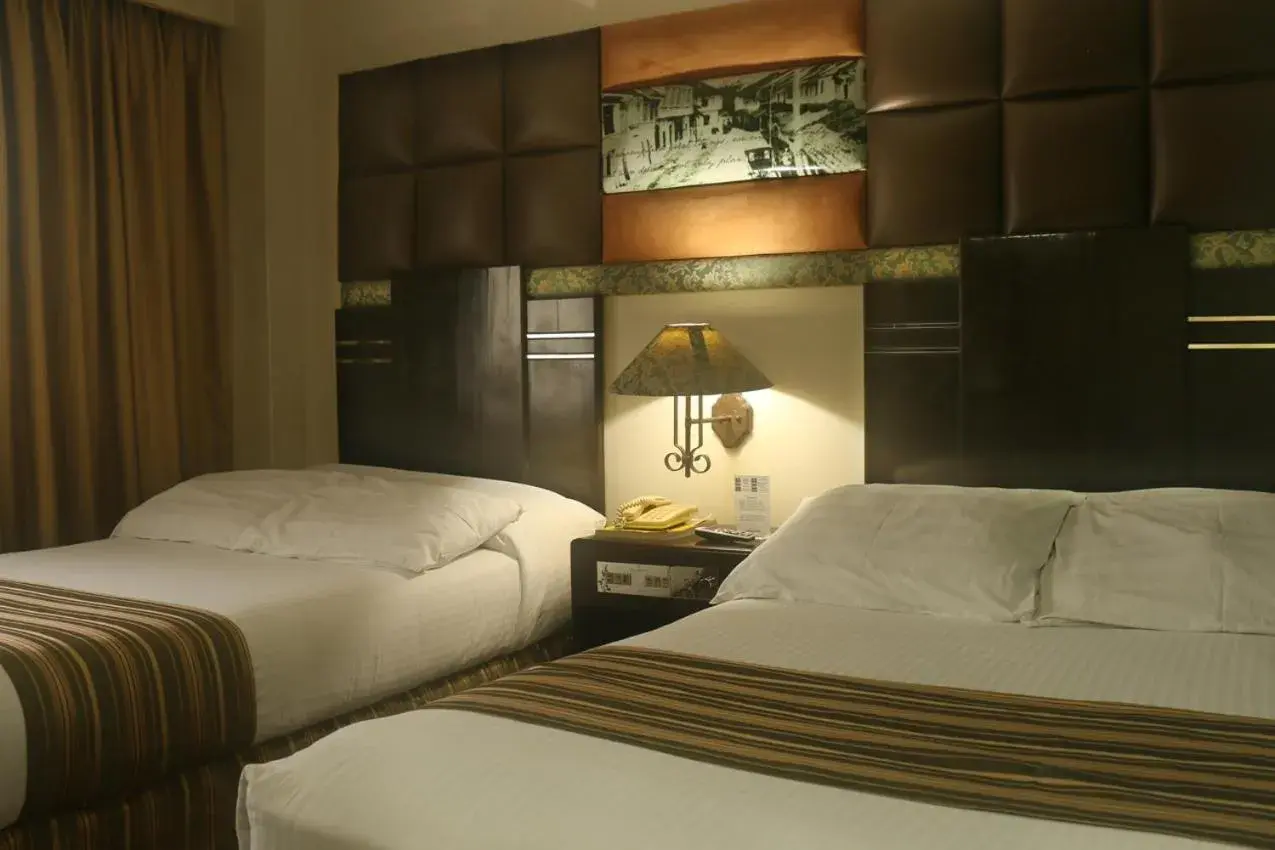 Bed in The Bellavista Hotel Bed in The Bellavista Hotel