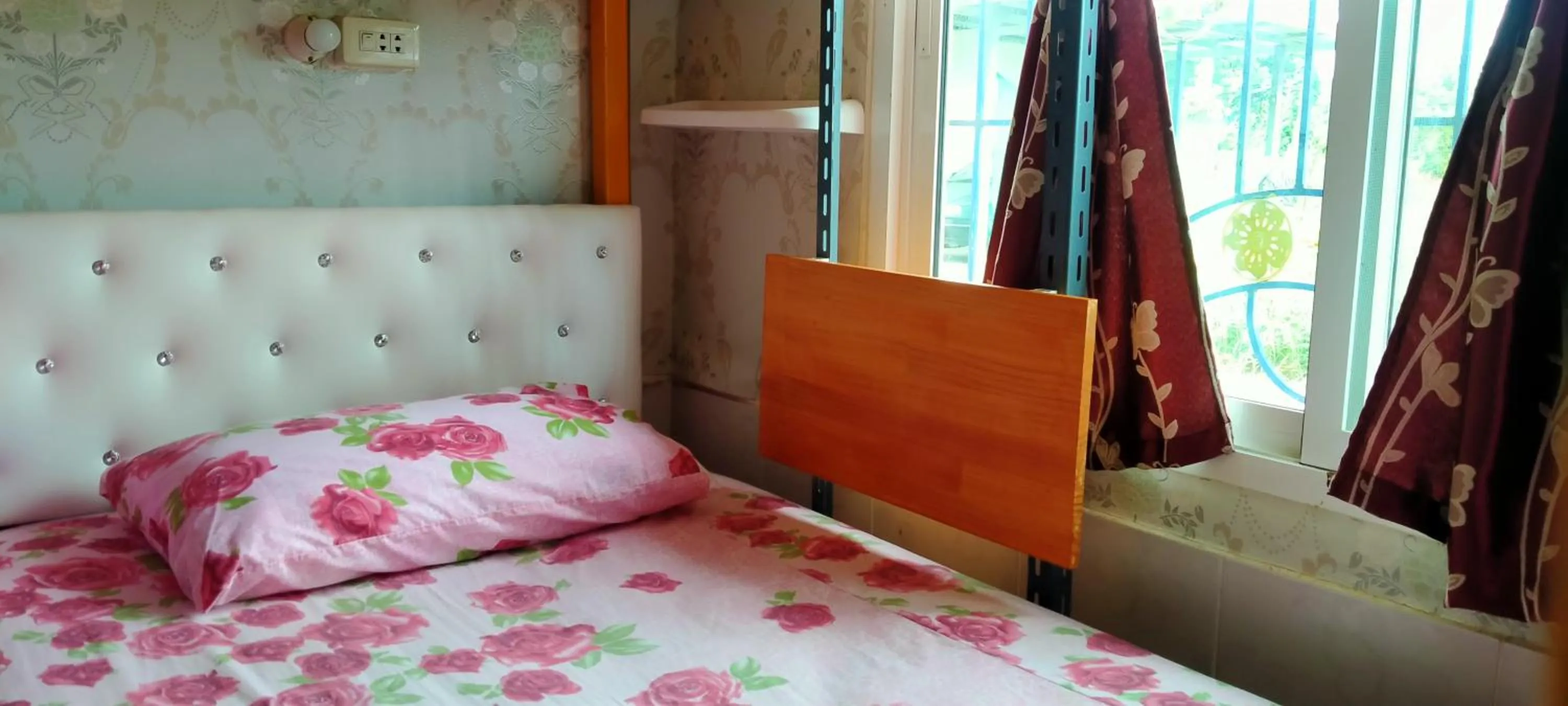 Bed in RuengsriSiri Guesthouse