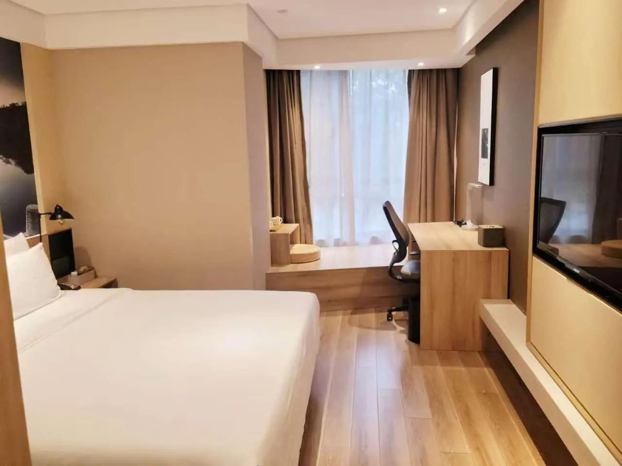 Bed in Atour Hotel Nanjing Sun Yat-sen Mausoleum Scenic Area Alfalfa Garden Subway Station