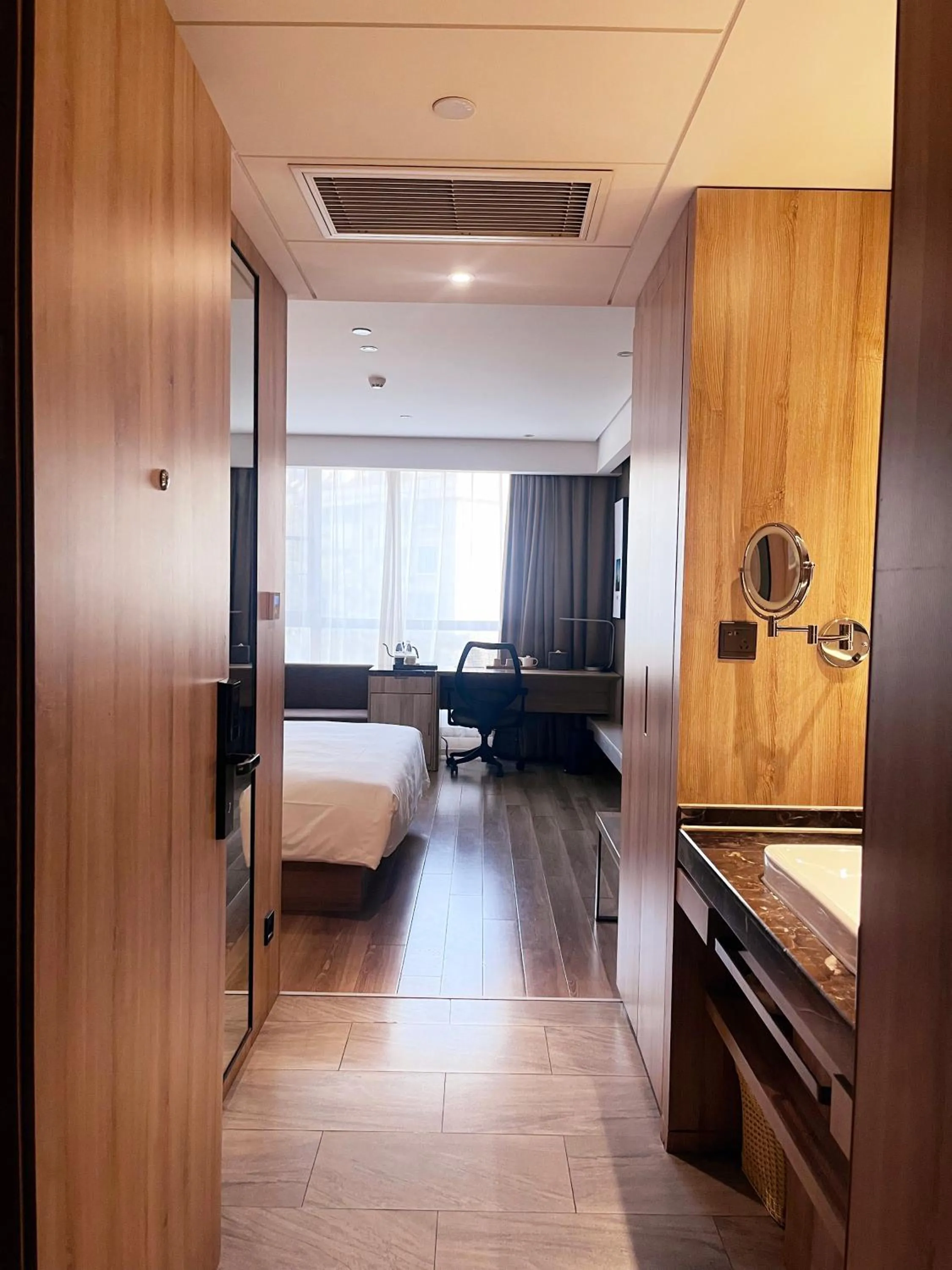 Bed in Atour Hotel Nanjing Sun Yat-sen Mausoleum Scenic Area Alfalfa Garden Subway Station