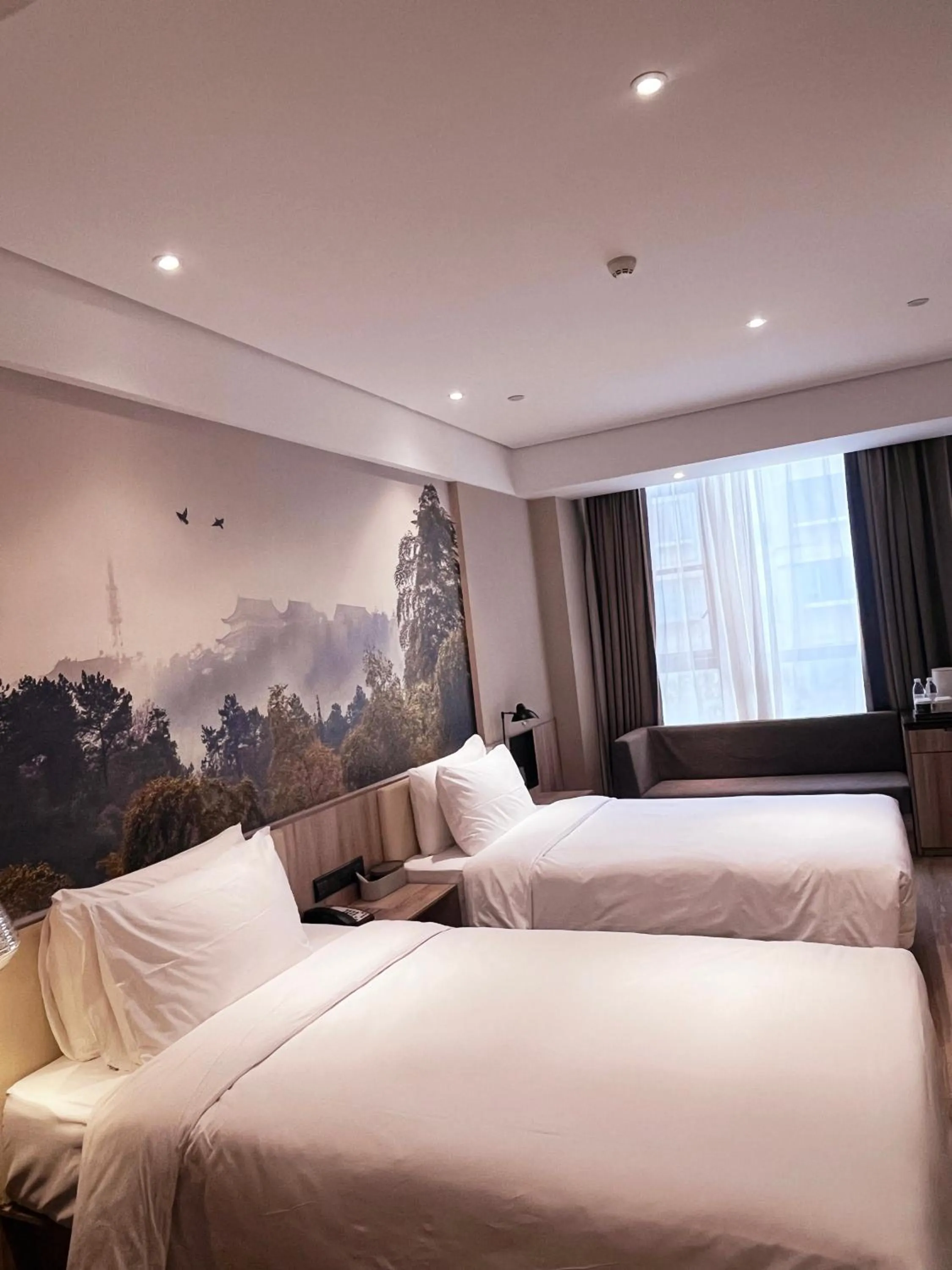 Bed in Atour Hotel Nanjing Sun Yat-sen Mausoleum Scenic Area Alfalfa Garden Subway Station