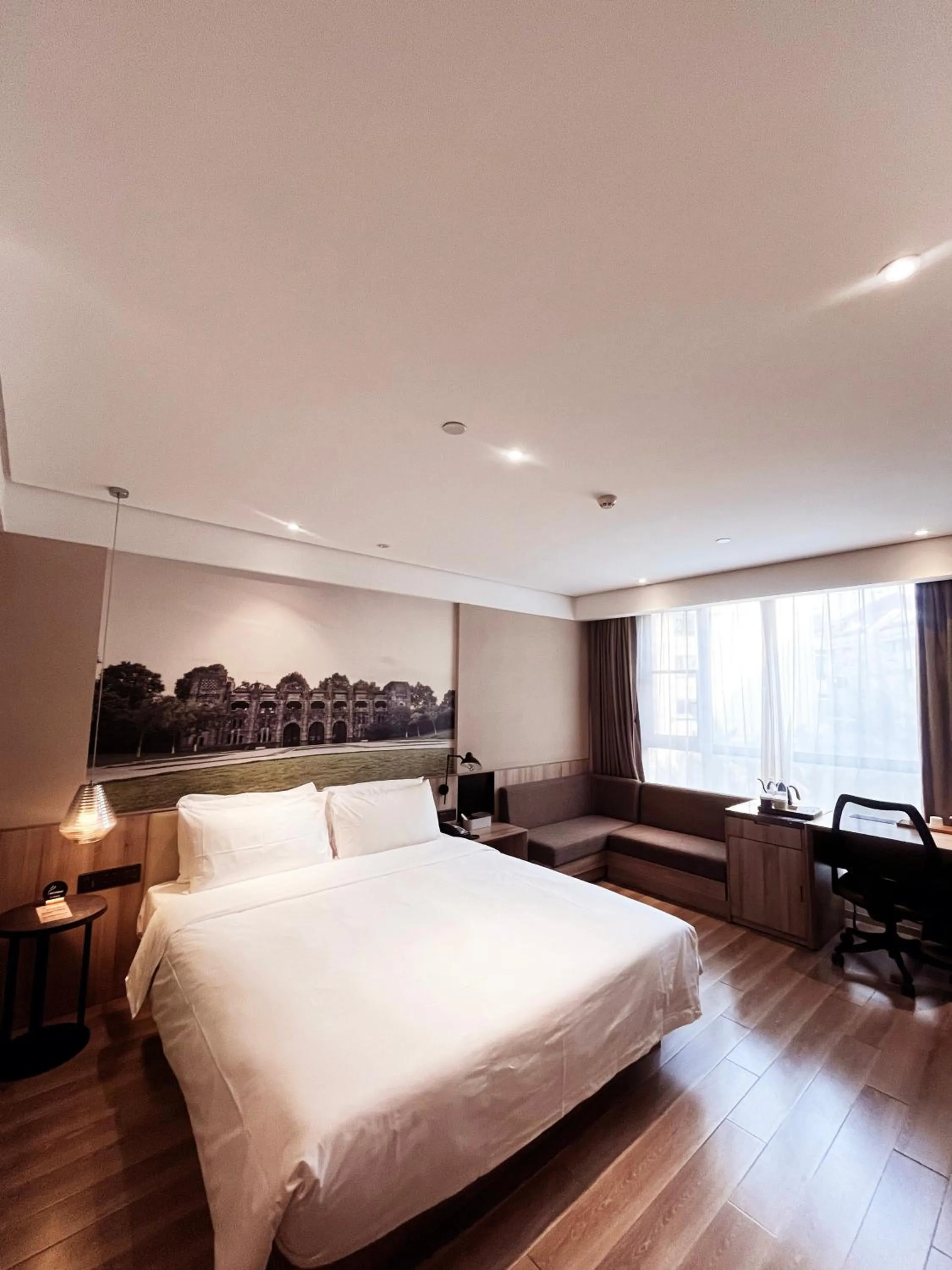 Bed in Atour Hotel Nanjing Sun Yat-sen Mausoleum Scenic Area Alfalfa Garden Subway Station