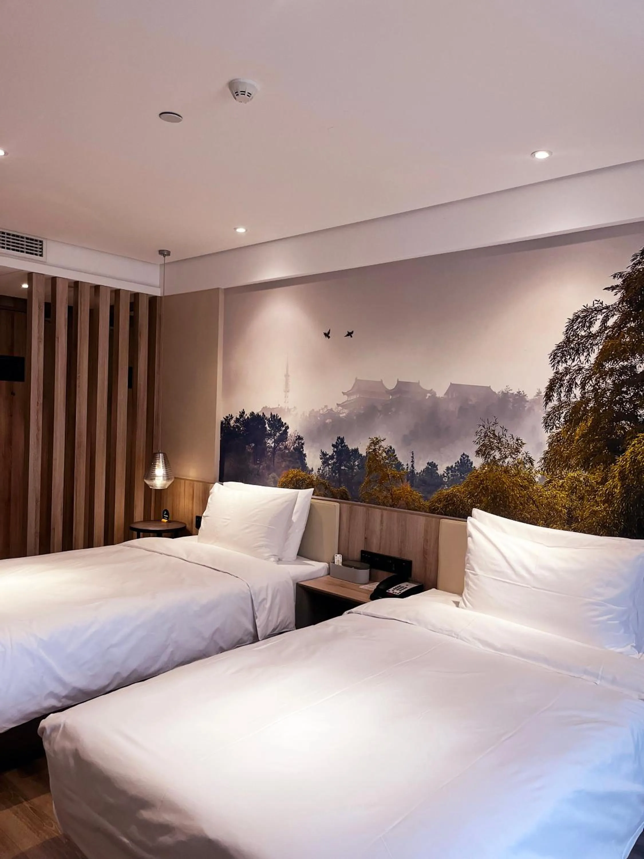 Bed in Atour Hotel Nanjing Sun Yat-sen Mausoleum Scenic Area Alfalfa Garden Subway Station