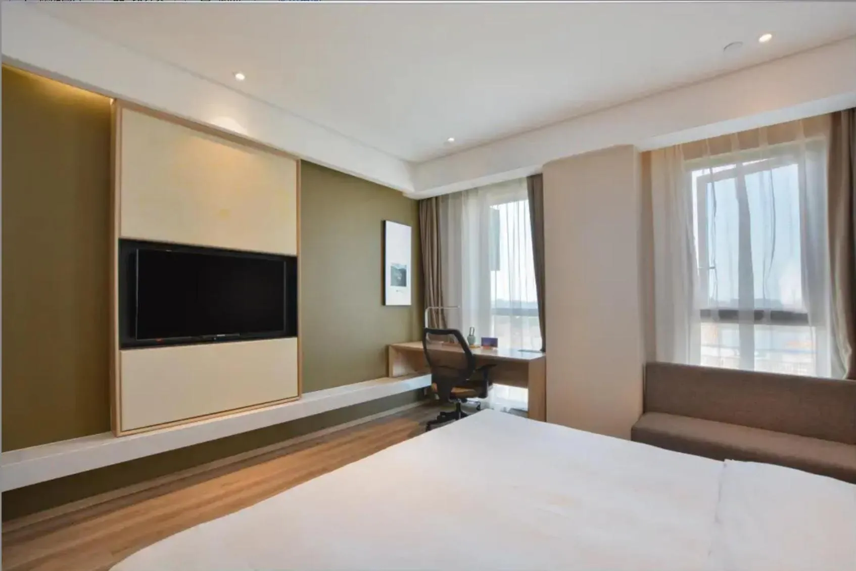 Bed in Atour Hotel Nanjing Sun Yat-sen Mausoleum Scenic Area Alfalfa Garden Subway Station