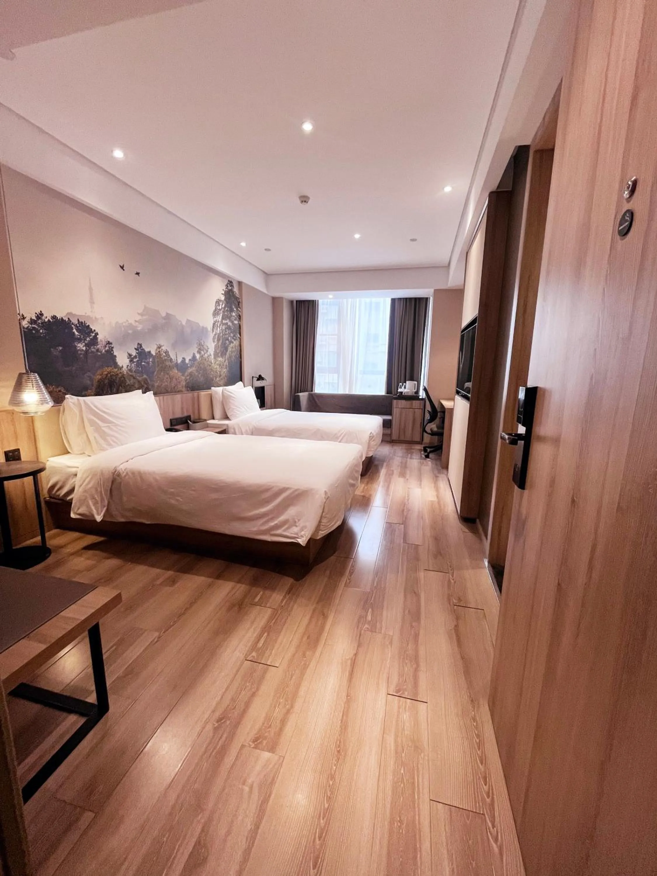 Bed in Atour Hotel Nanjing Sun Yat-sen Mausoleum Scenic Area Alfalfa Garden Subway Station