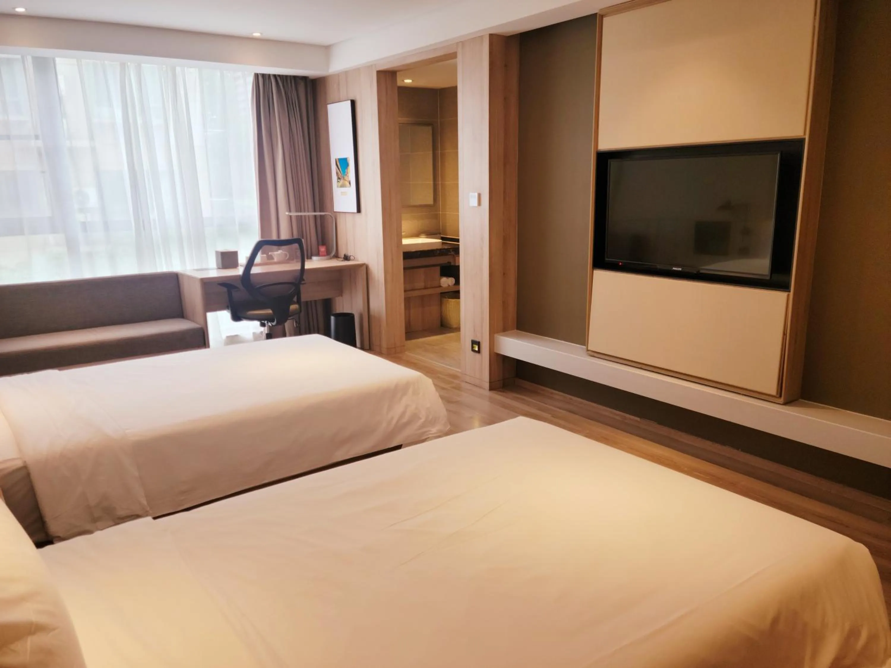 Bed in Atour Hotel Nanjing Sun Yat-sen Mausoleum Scenic Area Alfalfa Garden Subway Station