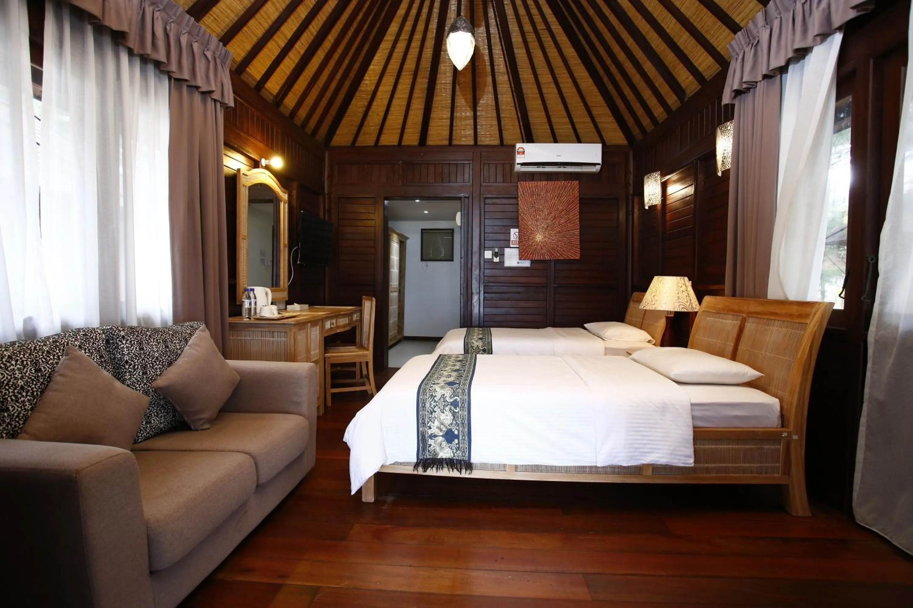 Bed in Sutera at Mantanani Island Resort & Spa