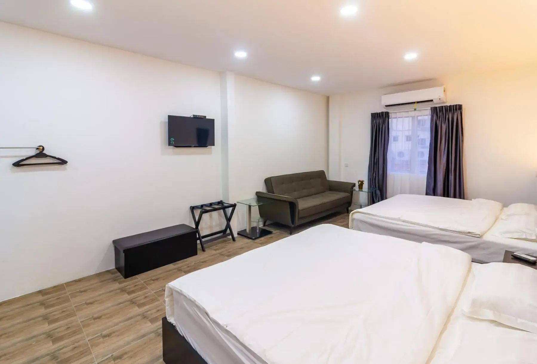 Seating area, Bed in Tambun Warm Hotel Seating area, Bed in Tambun Warm Hotel