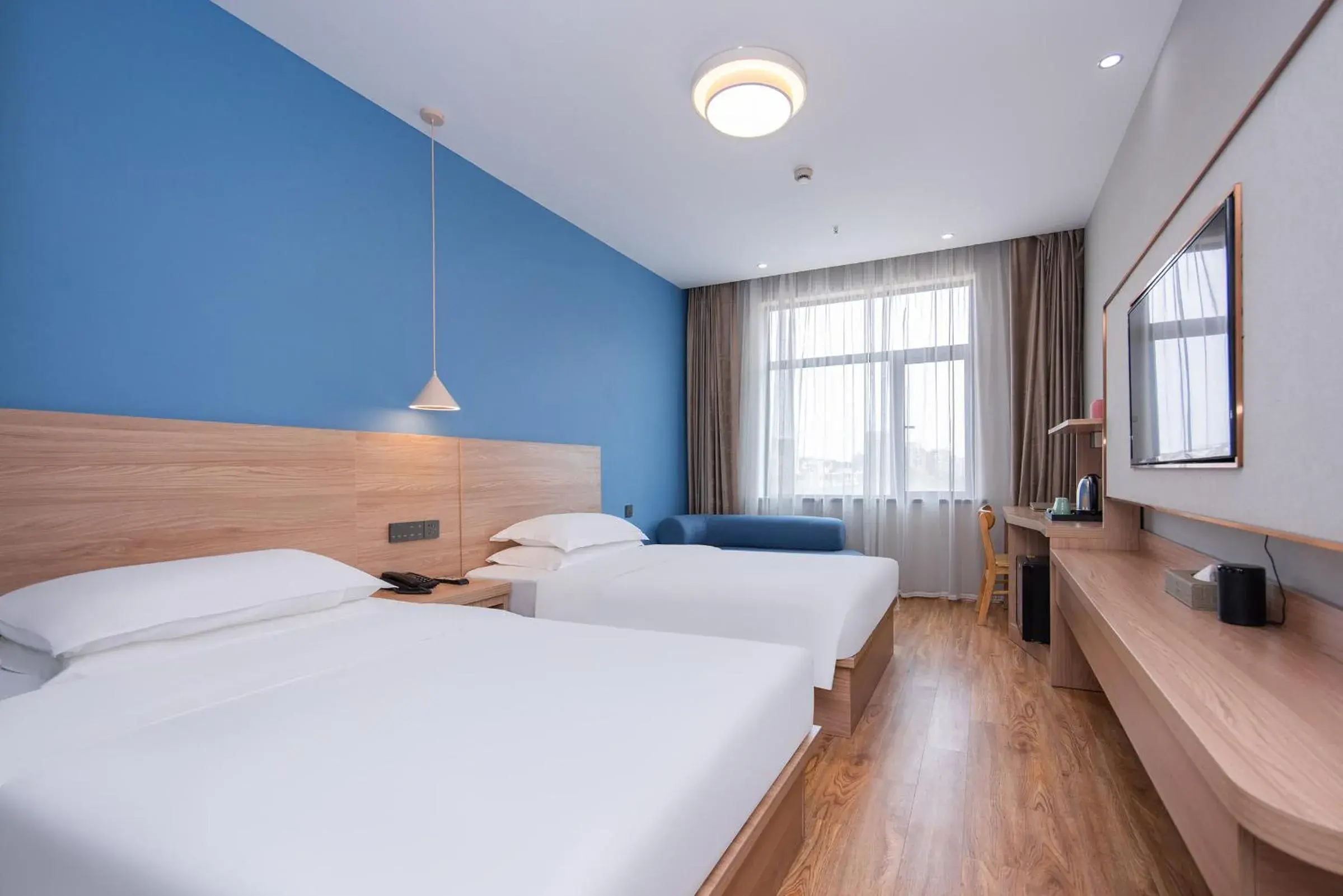 Bed in Future Shangju Hotel Bed in Future Shangju Hotel