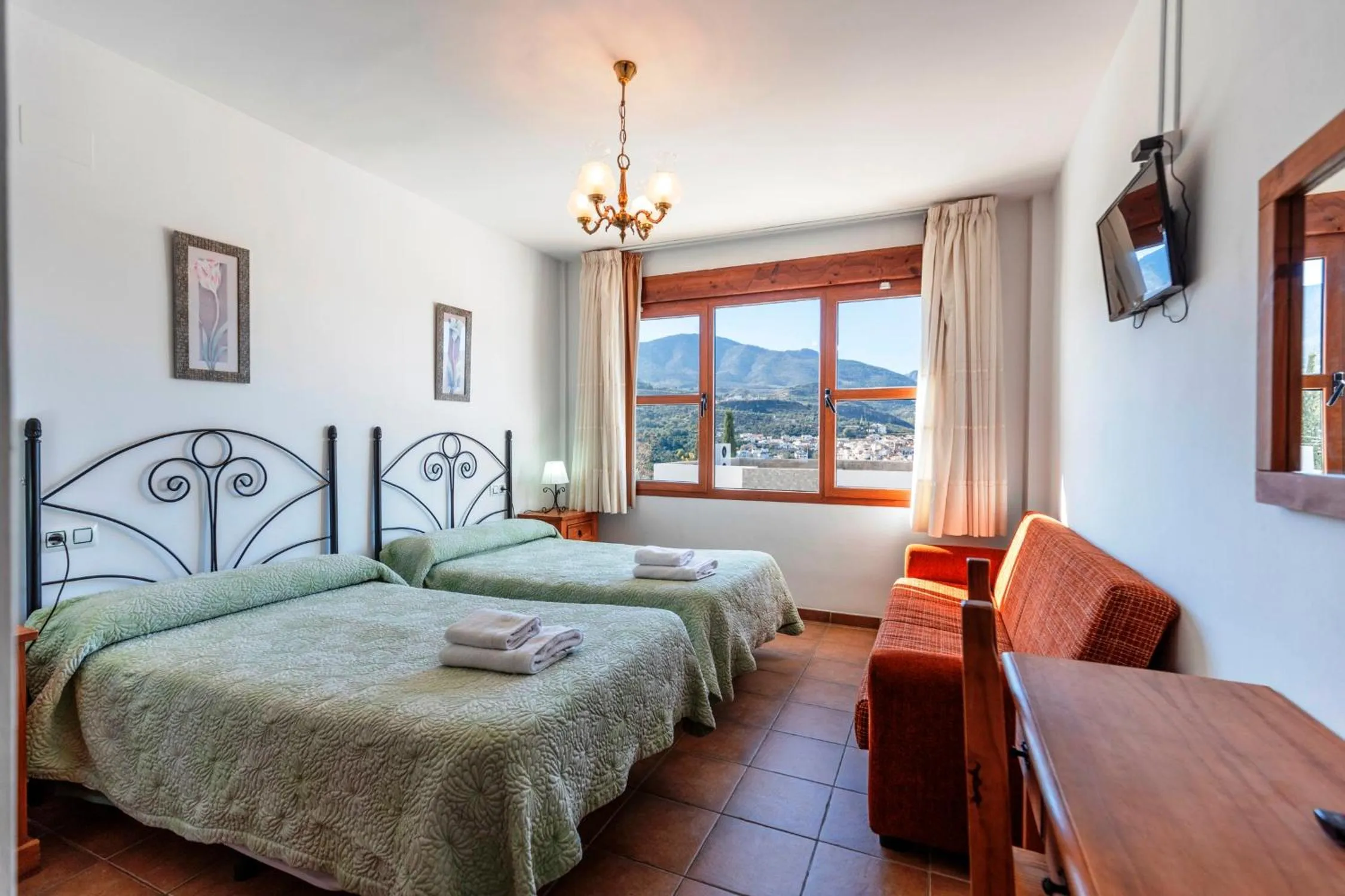 Bed in Hostal y Apartamento Rural Los Naranjos