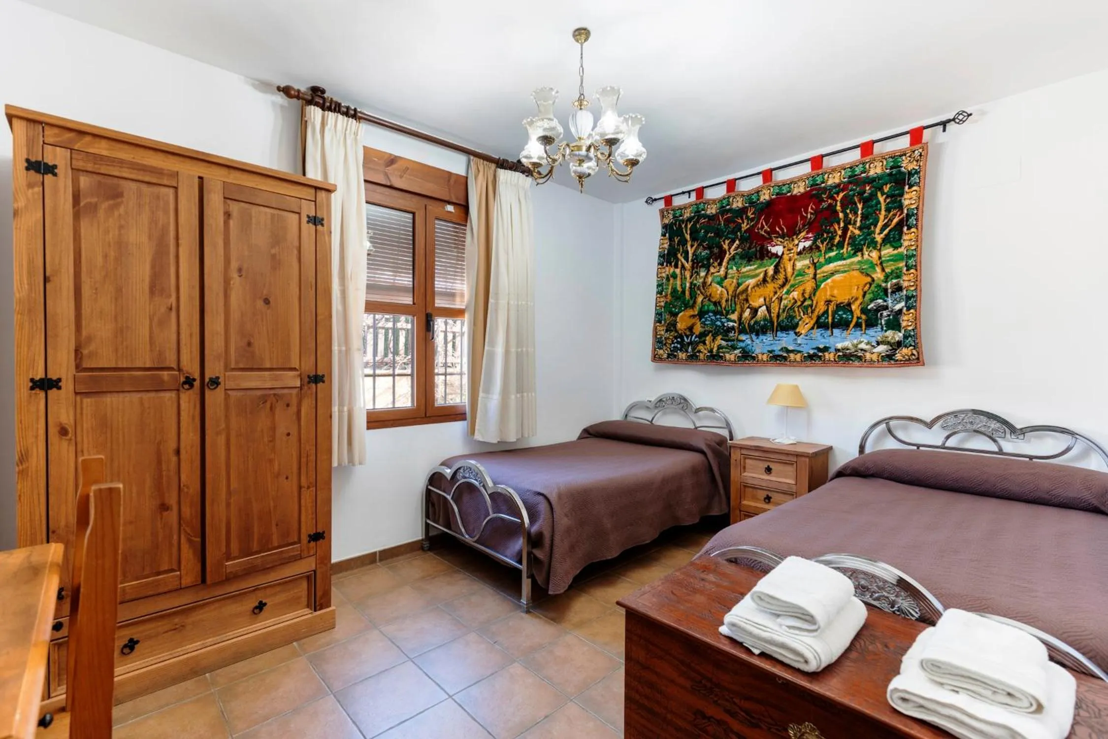 Bed in Hostal y Apartamento Rural Los Naranjos