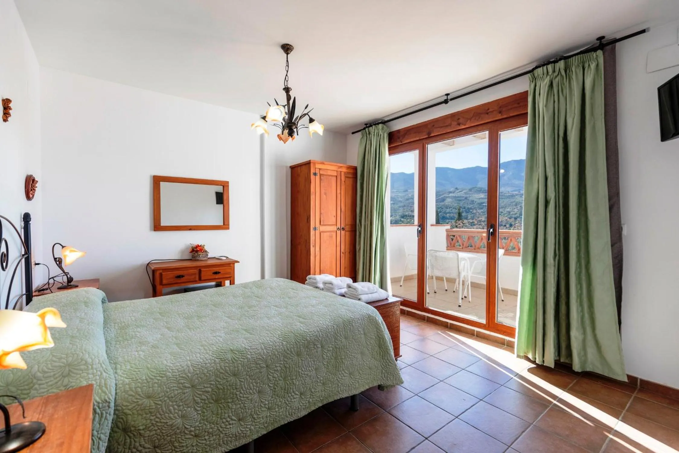 Bed in Hostal y Apartamento Rural Los Naranjos